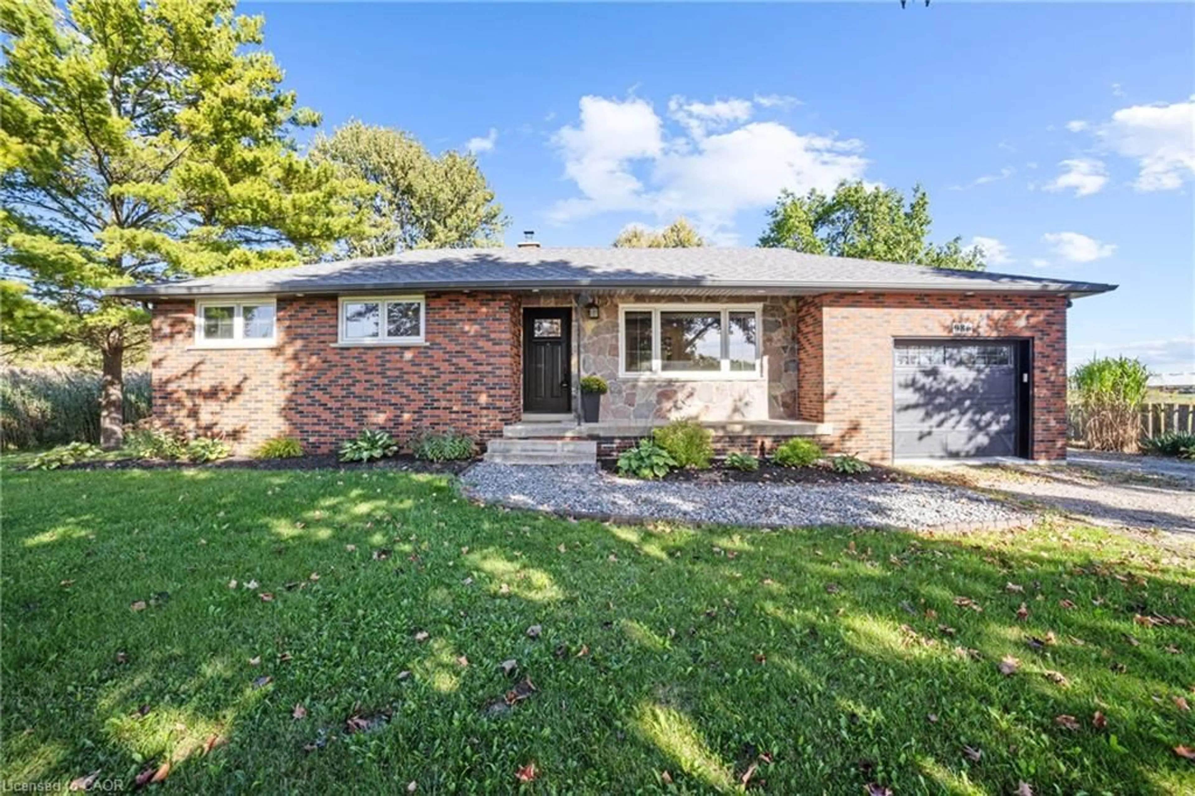 Home with brick exterior material, street for 986 Westover Rd, Hamilton Ontario N0B 1L0