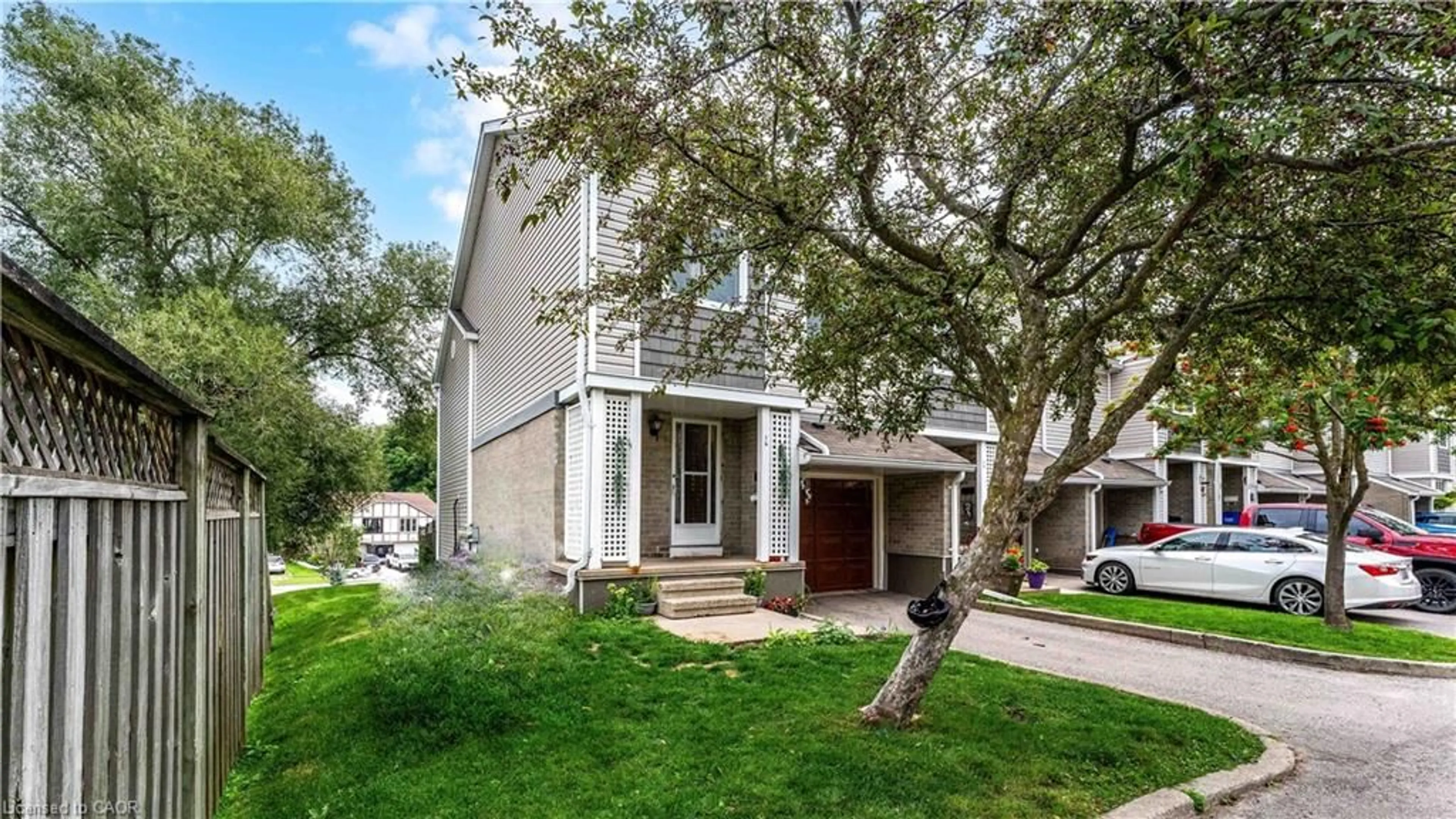 Home with vinyl exterior material, street for 365 Pioneer Dr #16, Kitchener Ontario N2P 2A6