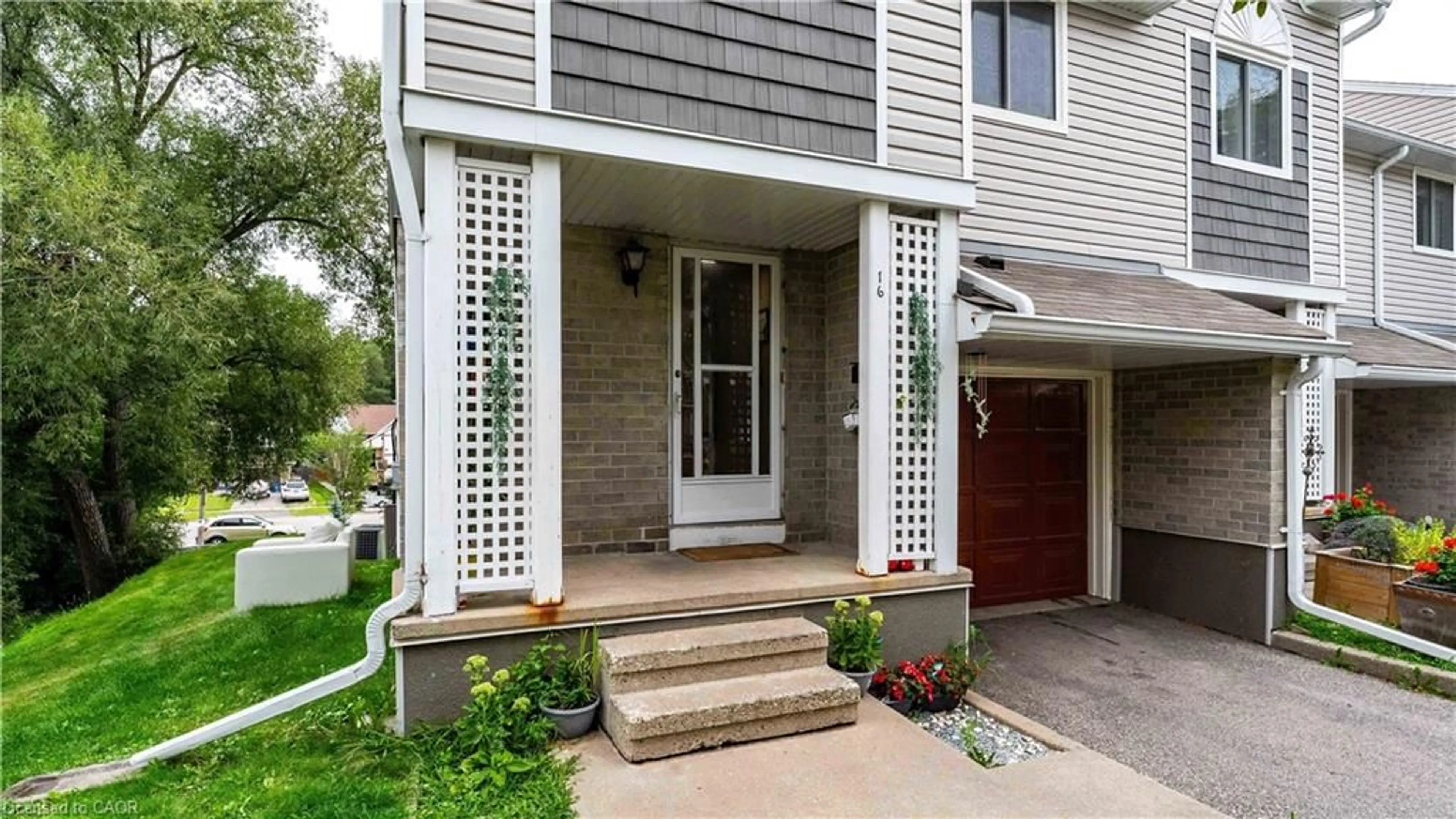 Home with brick exterior material, street for 365 Pioneer Dr #16, Kitchener Ontario N2P 2A6
