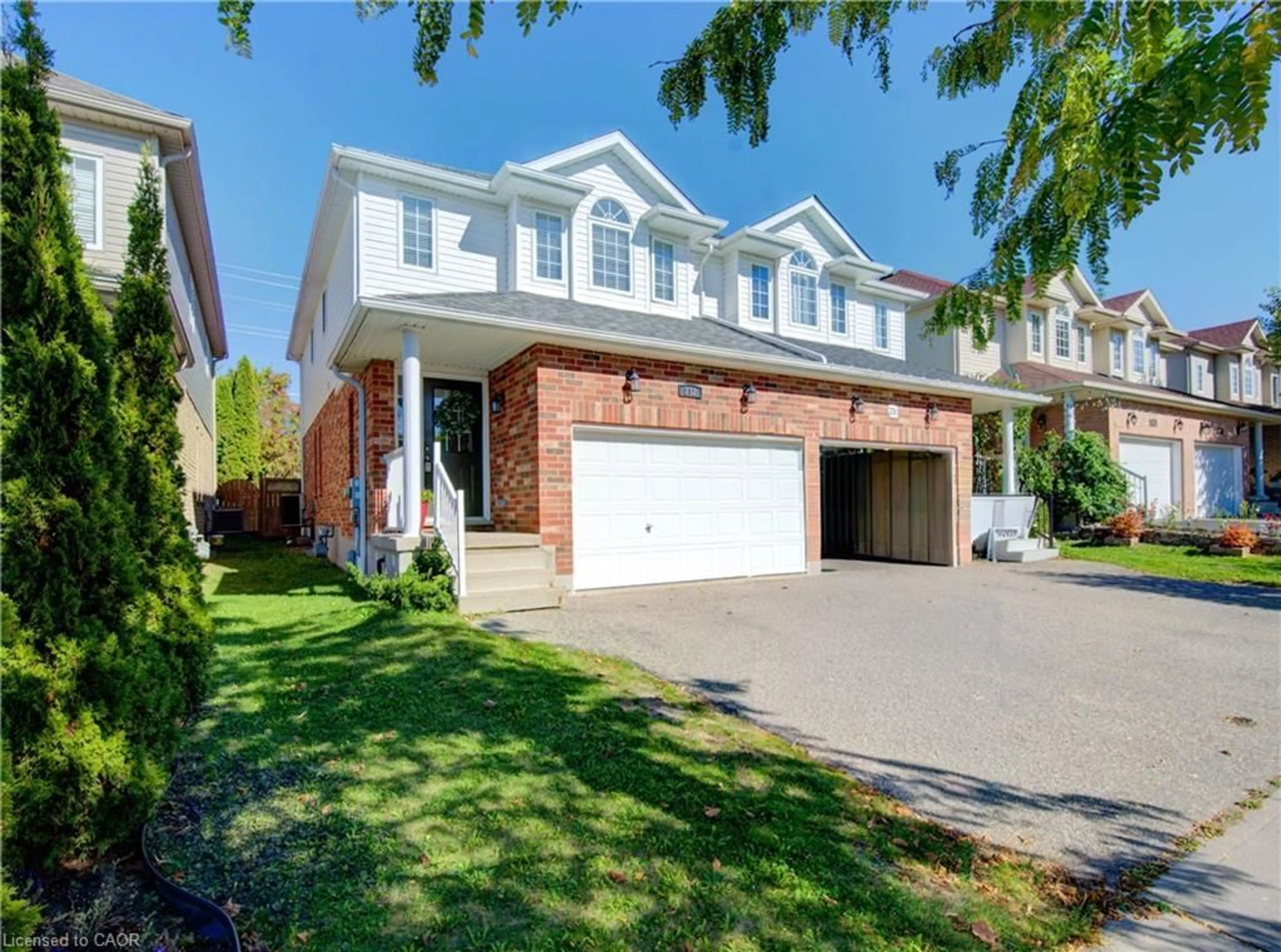 Home with brick exterior material, street for 232 Buttercup Crt, Waterloo Ontario N2V 2W8