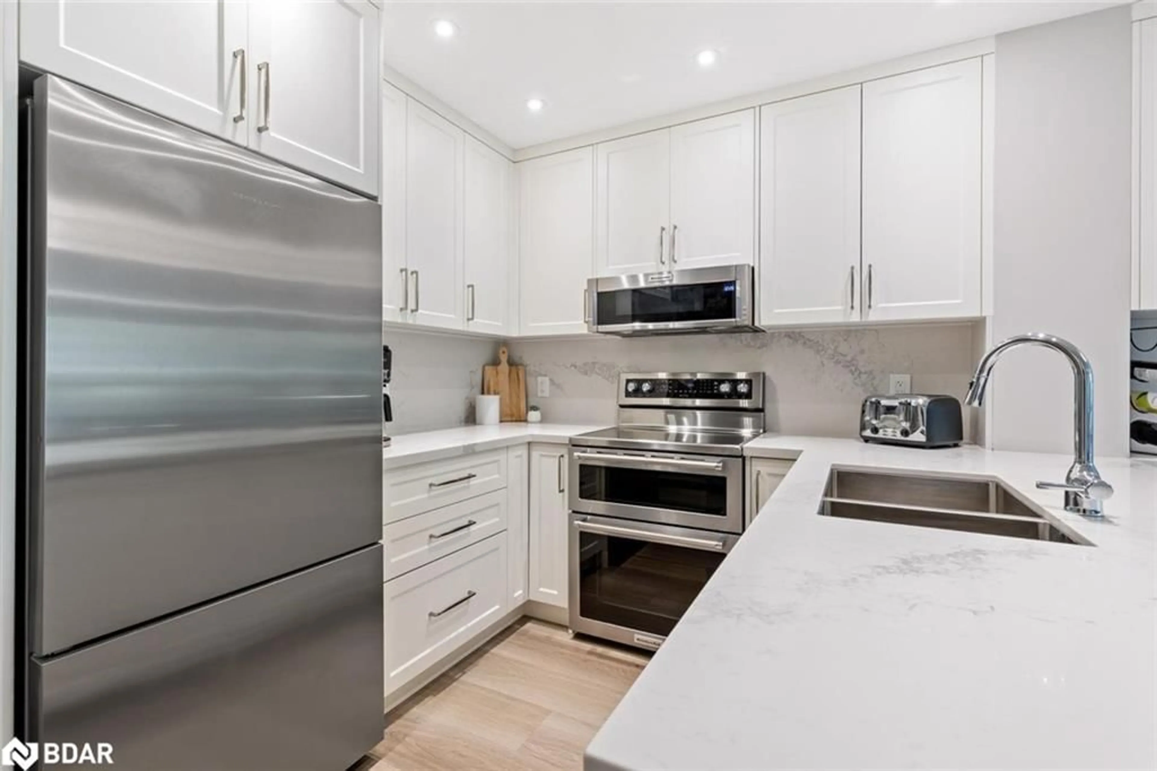 Open concept kitchen, unknown for 5025 Four Springs Avenue #111, Mississauga Ontario L5R 0G5