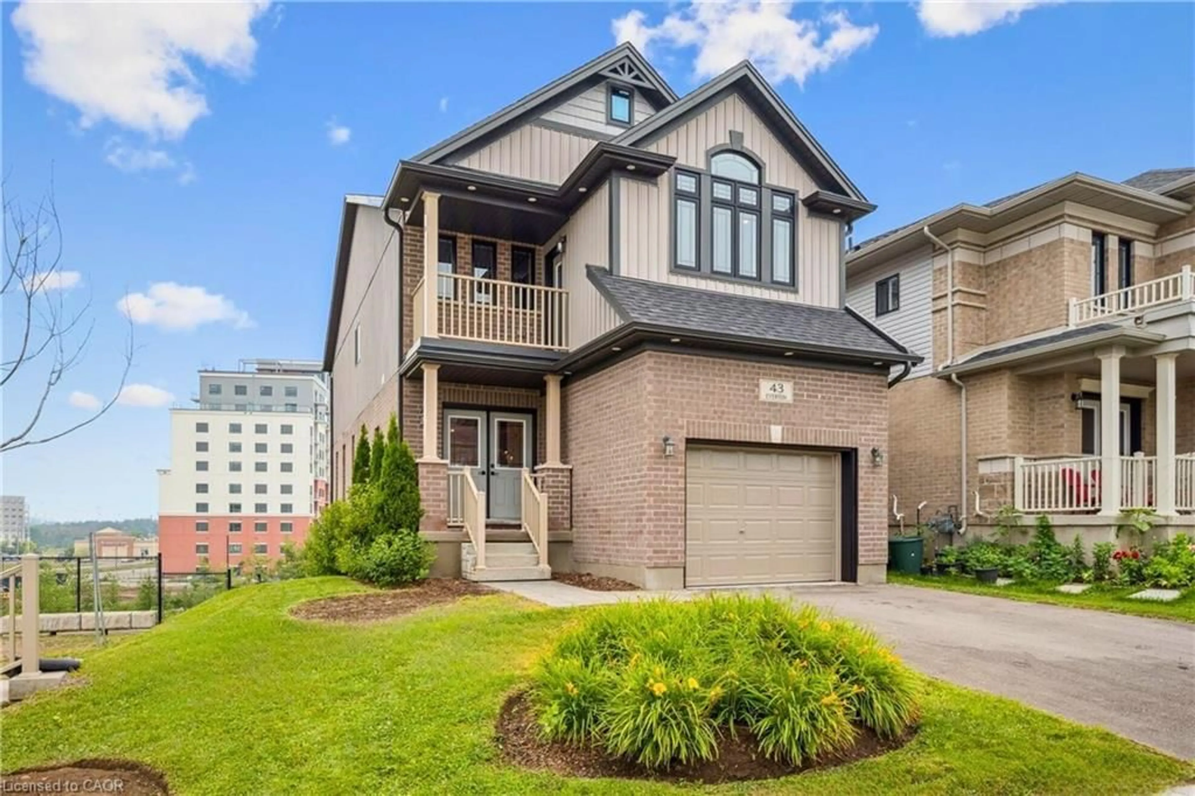 Home with brick exterior material, street for 43 Everton Dr, Guelph Ontario N1E 0R9