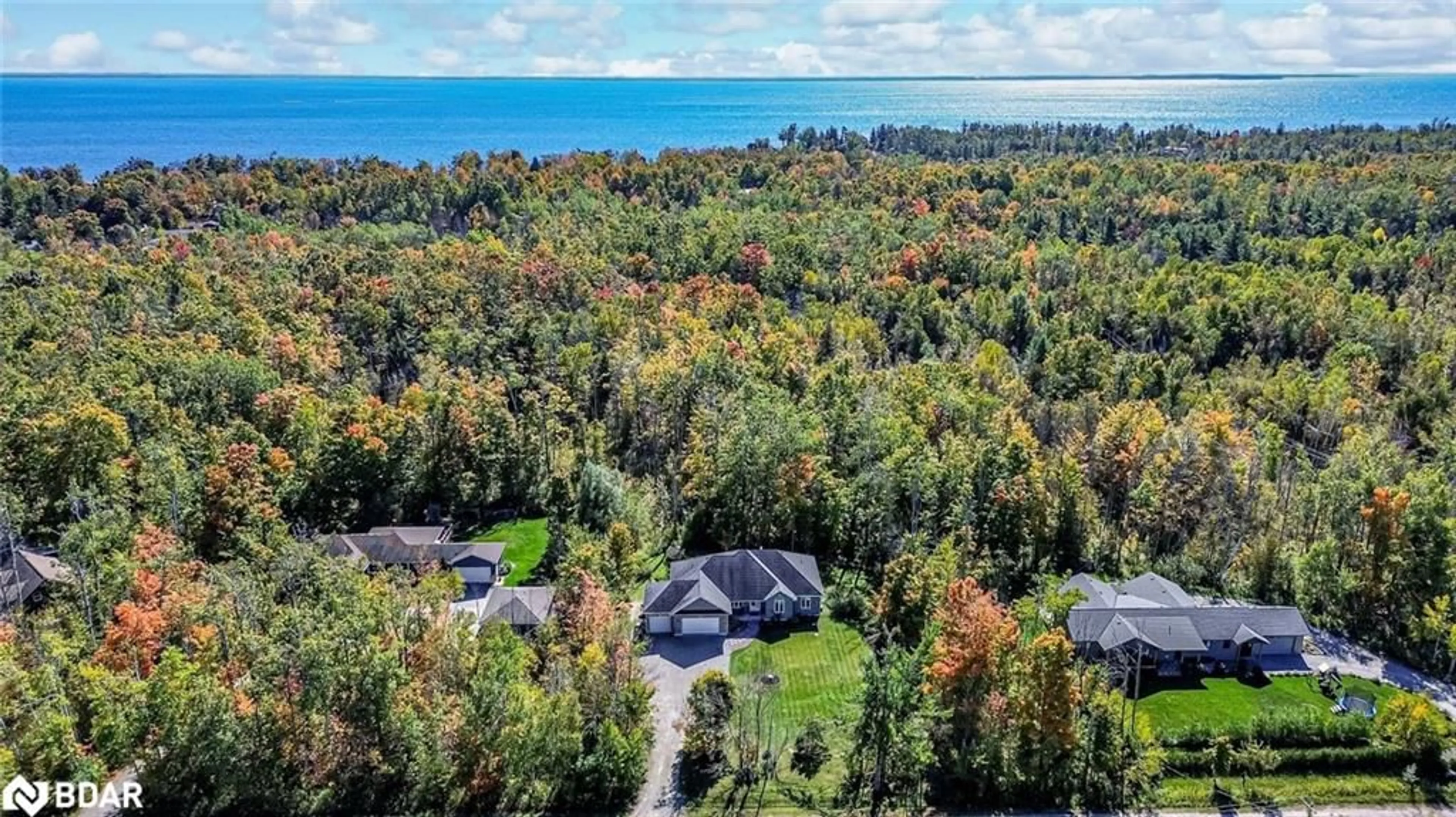 A pic from outside/outdoor area/front of a property/back of a property/a pic from drone, water/lake/river/ocean view for 33 Springhome Rd, Oro-Medonte Ontario L0L 1T0