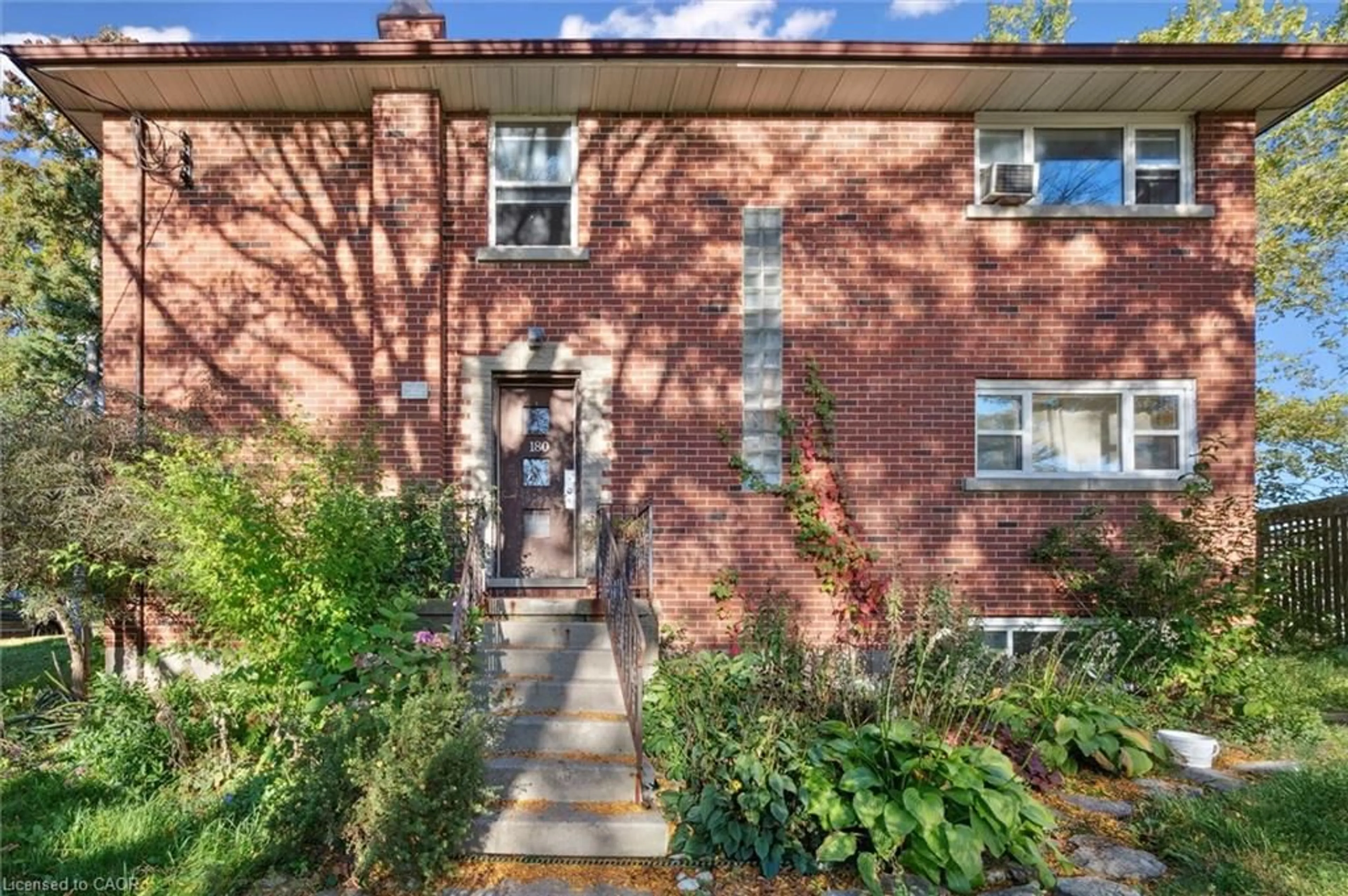 Home with brick exterior material, street for 180 Becker St, Kitchener Ontario N2B 1X7