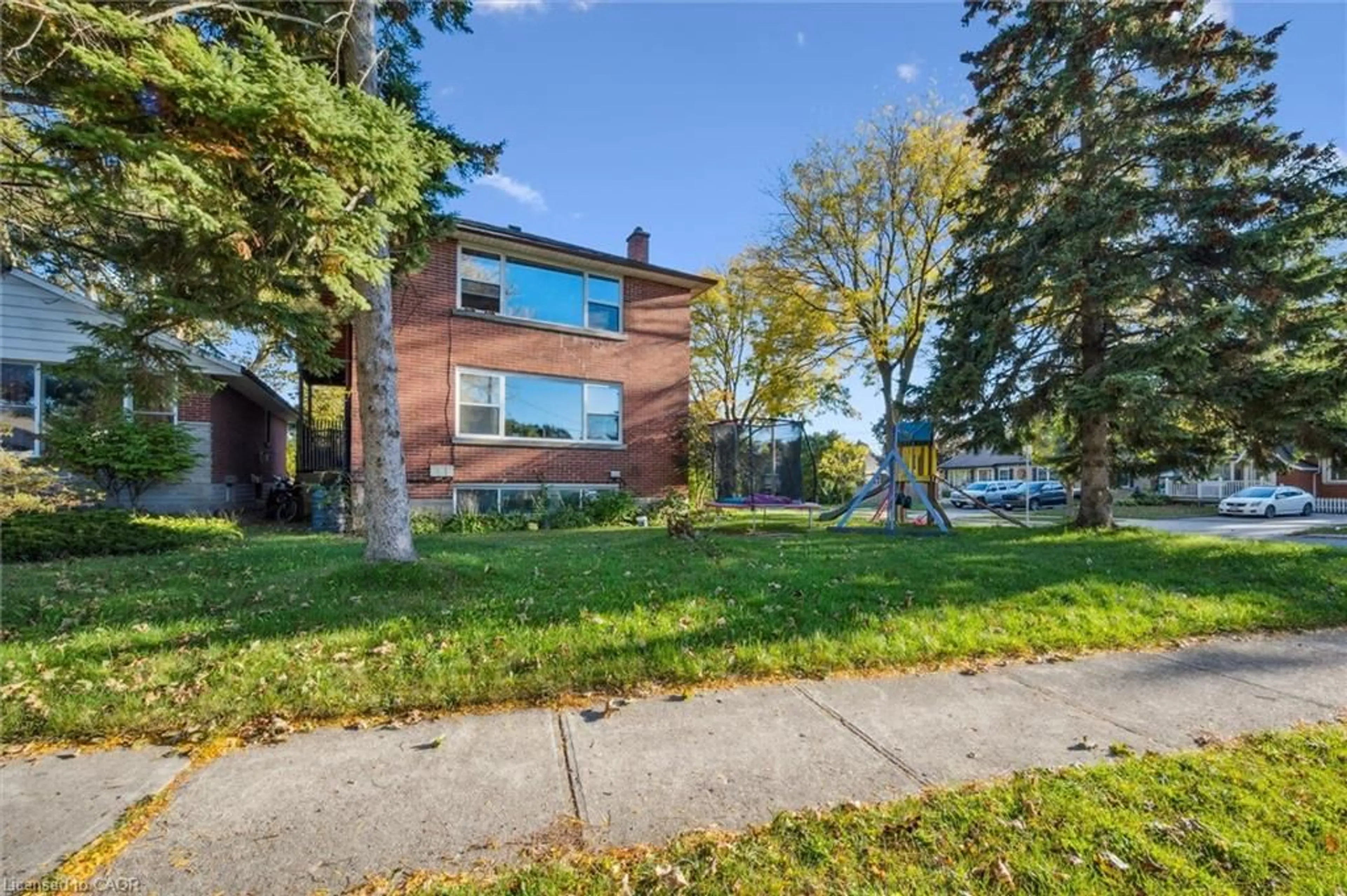 Home with brick exterior material, street for 180 Becker St, Kitchener Ontario N2B 1X7