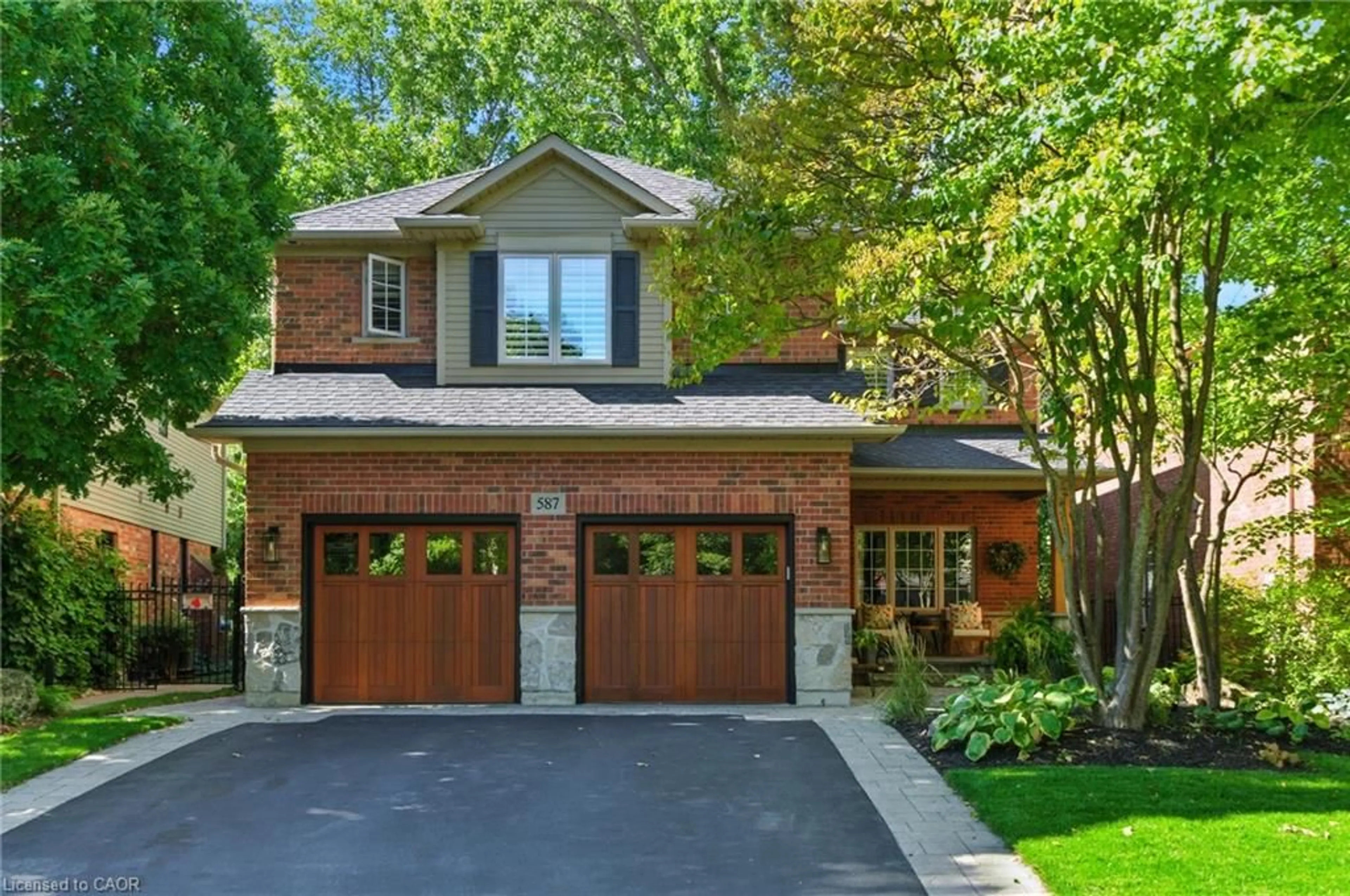 Home with brick exterior material, street for 587 Sandcherry Dr, Burlington Ontario L7T 4L7