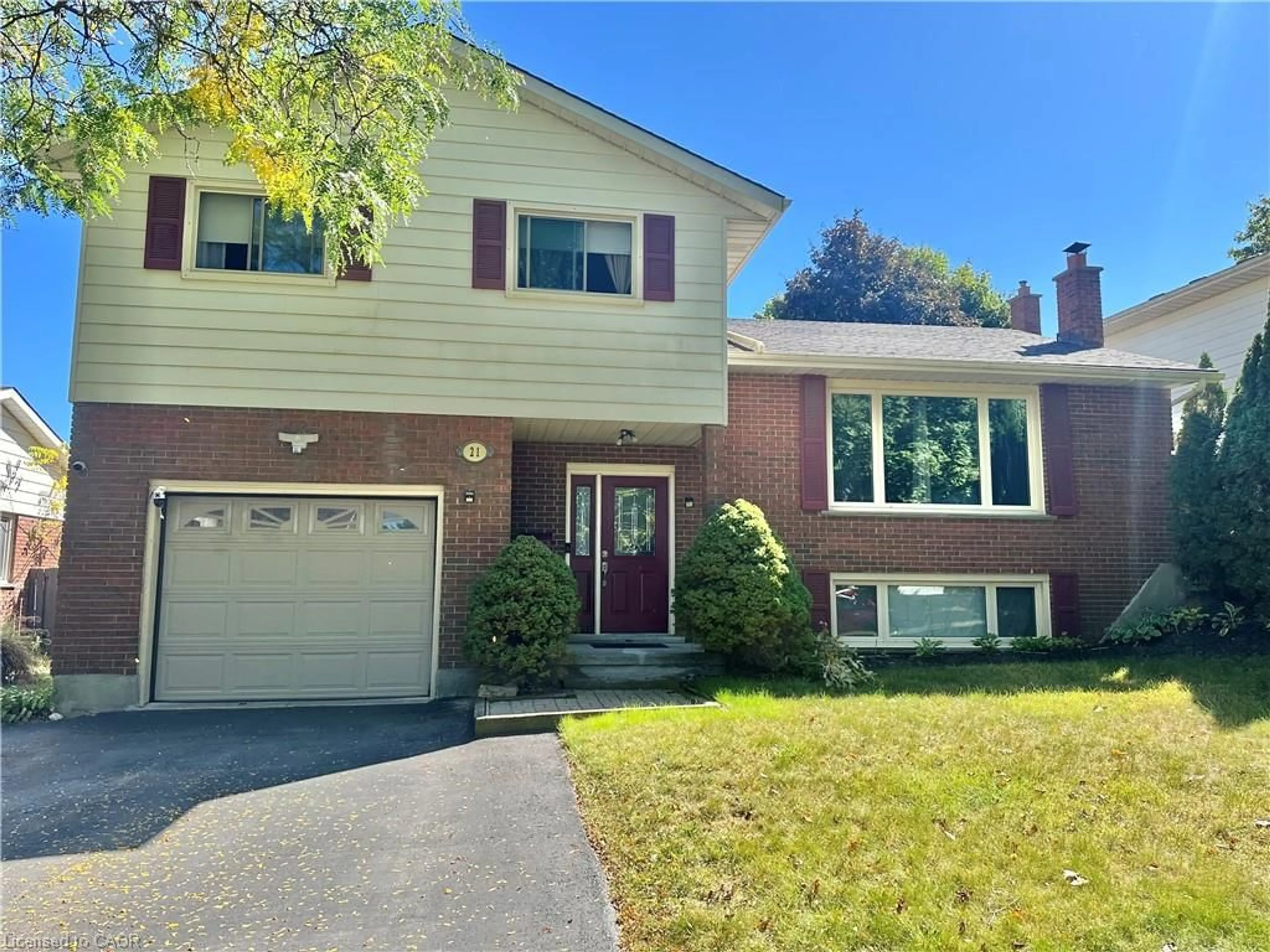 Home with brick exterior material, street for 21 Carriage Rd, Simcoe Ontario N3Y 4Y3