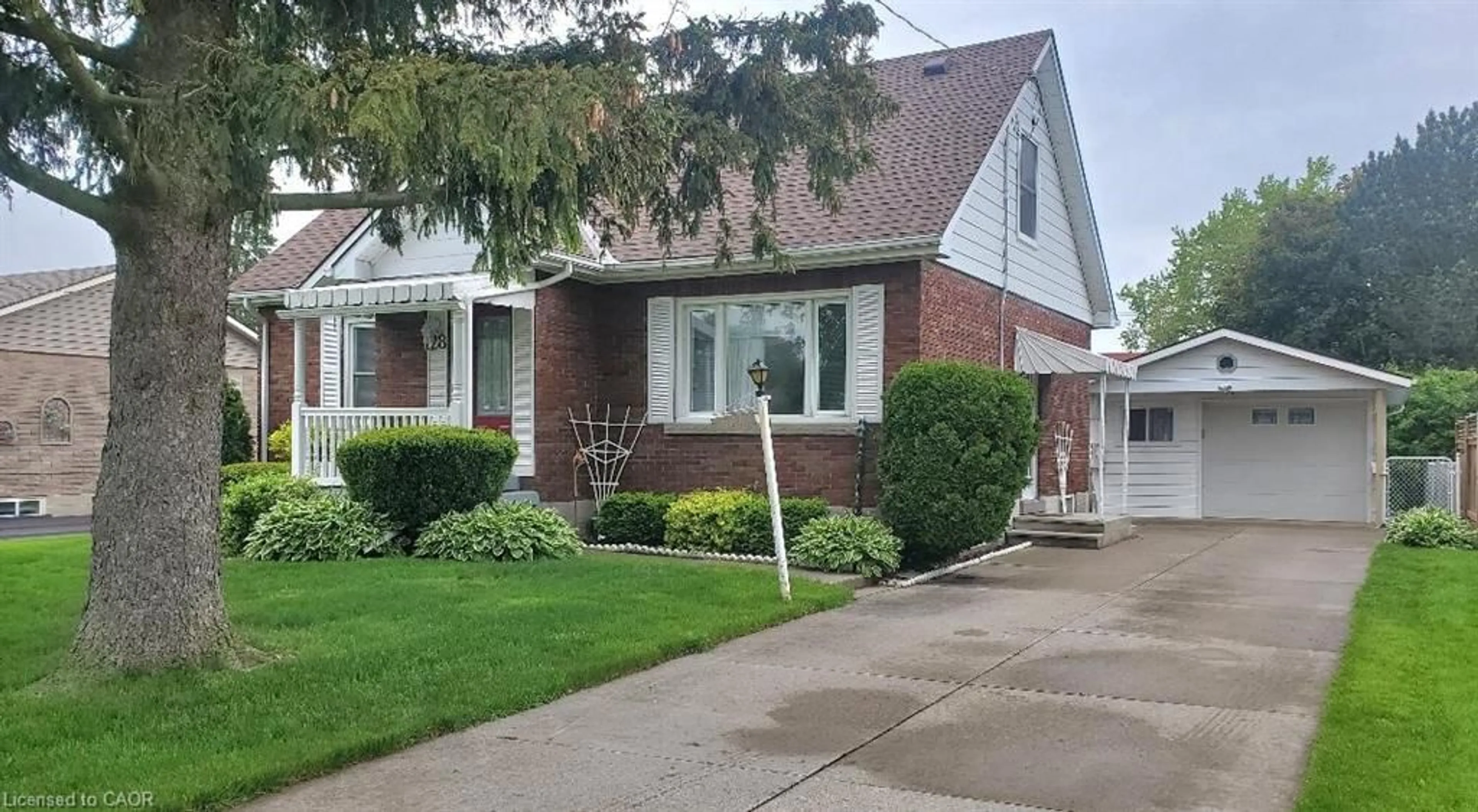 Home with brick exterior material, street for 128 Woods St, Stratford Ontario N5A 1M4