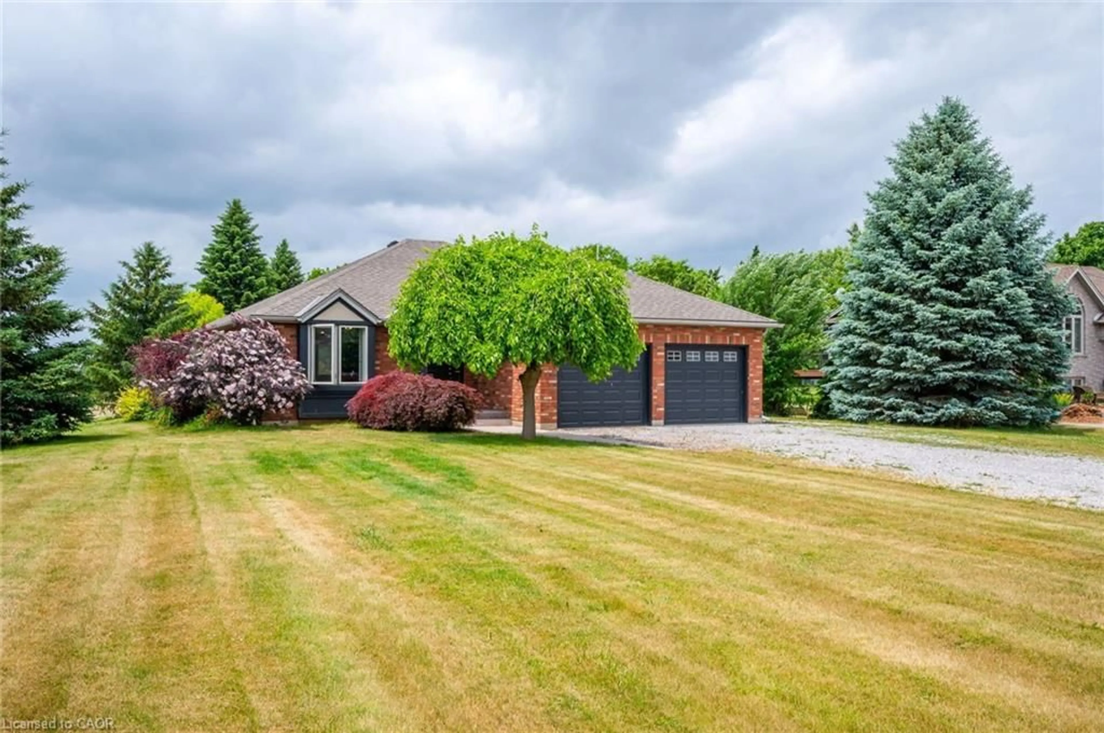 Home with brick exterior material, street for 307 Brant County Rd #18, Brantford Ontario N3T 3J8