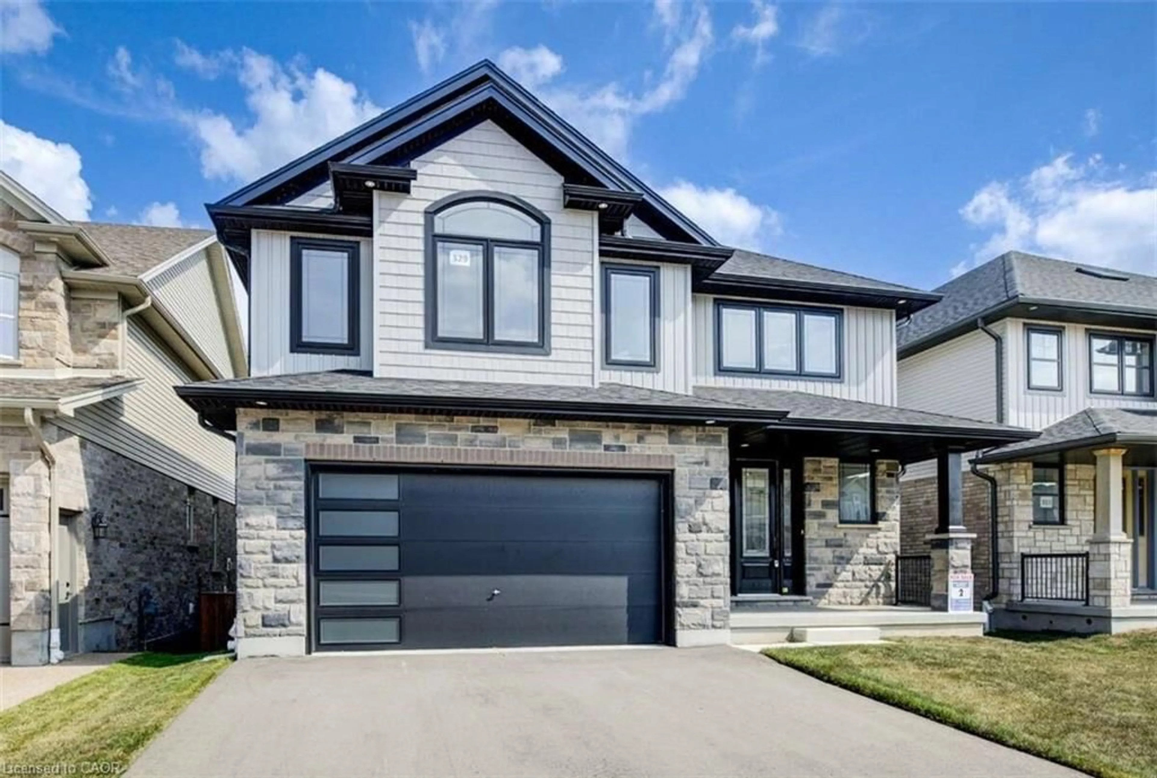 Home with brick exterior material, street for 329 Rivertrail Ave, Kitchener Ontario N2A 0K6
