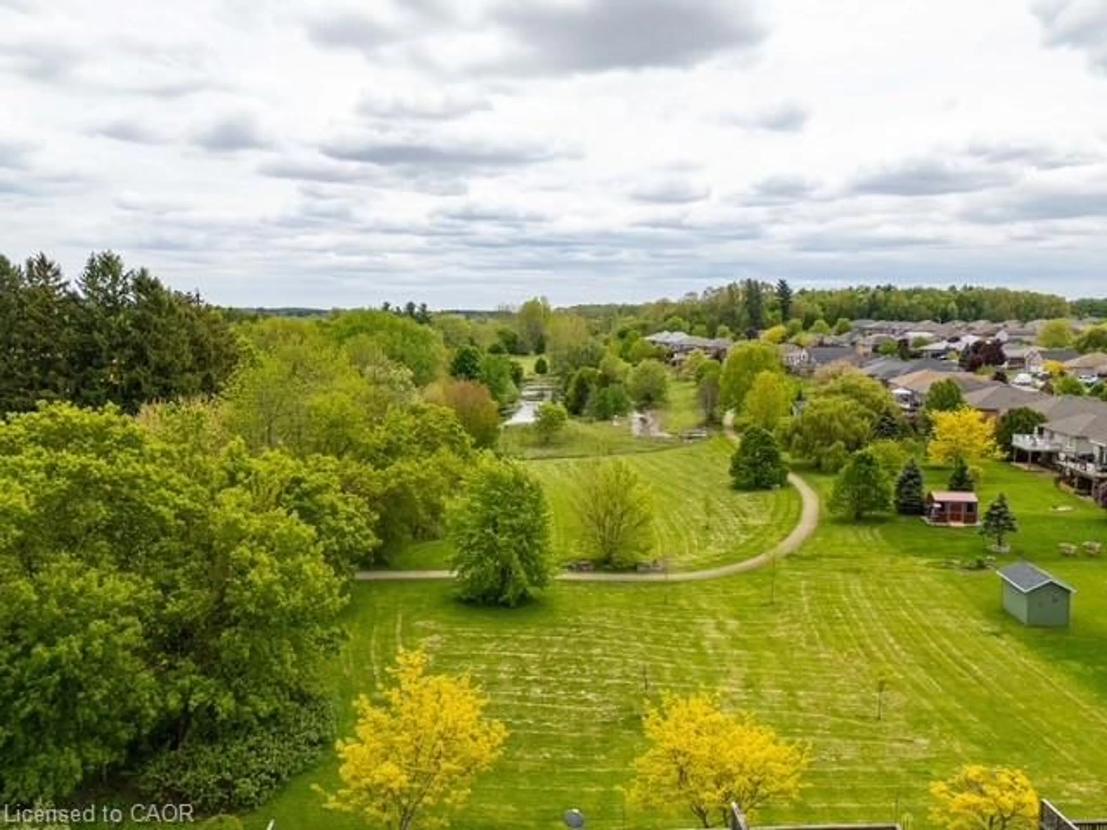 A pic from outside/outdoor area/front of a property/back of a property/a pic from drone, water/lake/river/ocean view for 409 Queen St #8, Simcoe Ontario N3Y 0A1