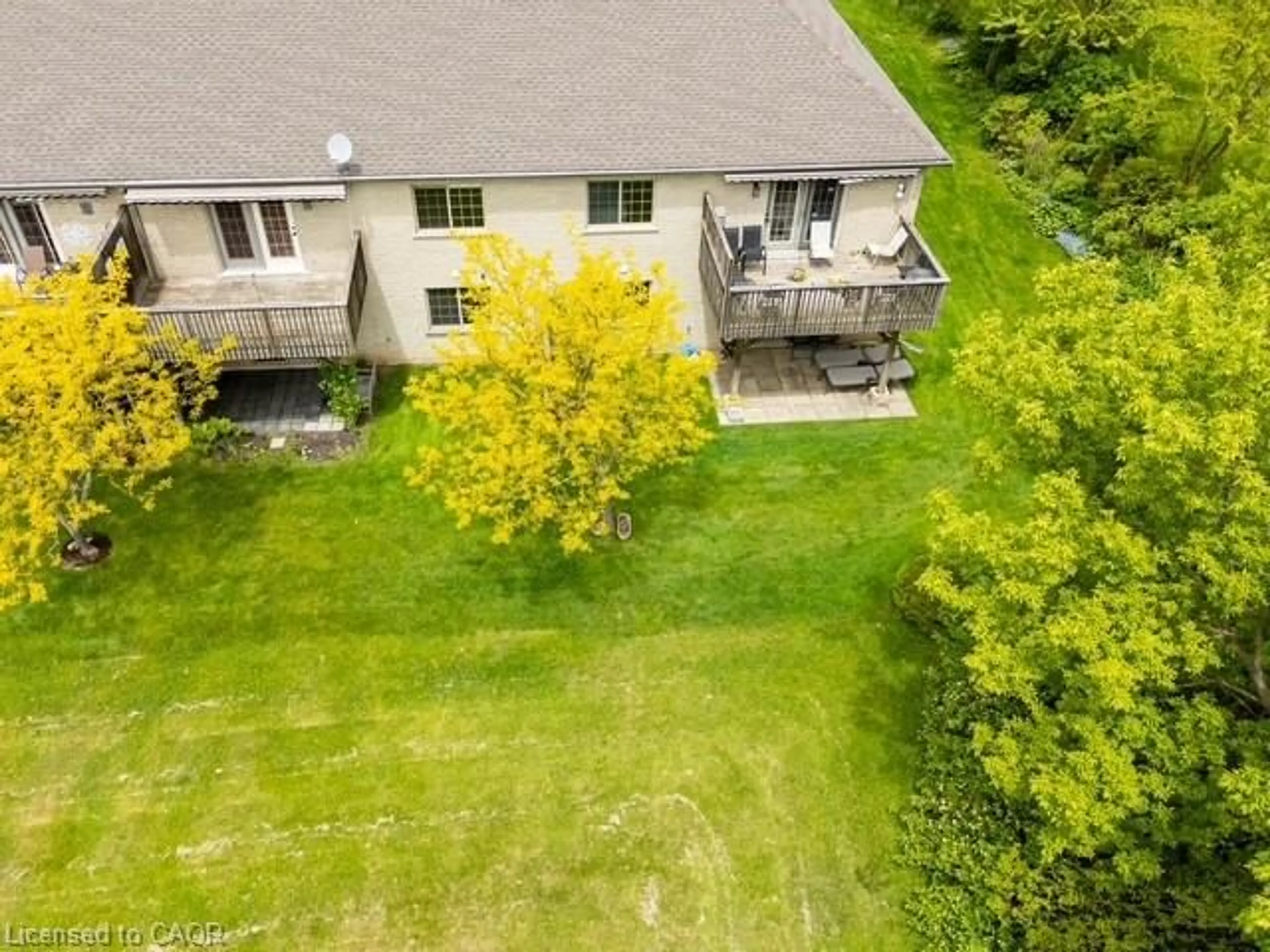 A pic from outside/outdoor area/front of a property/back of a property/a pic from drone, unknown for 409 Queen St #8, Simcoe Ontario N3Y 0A1