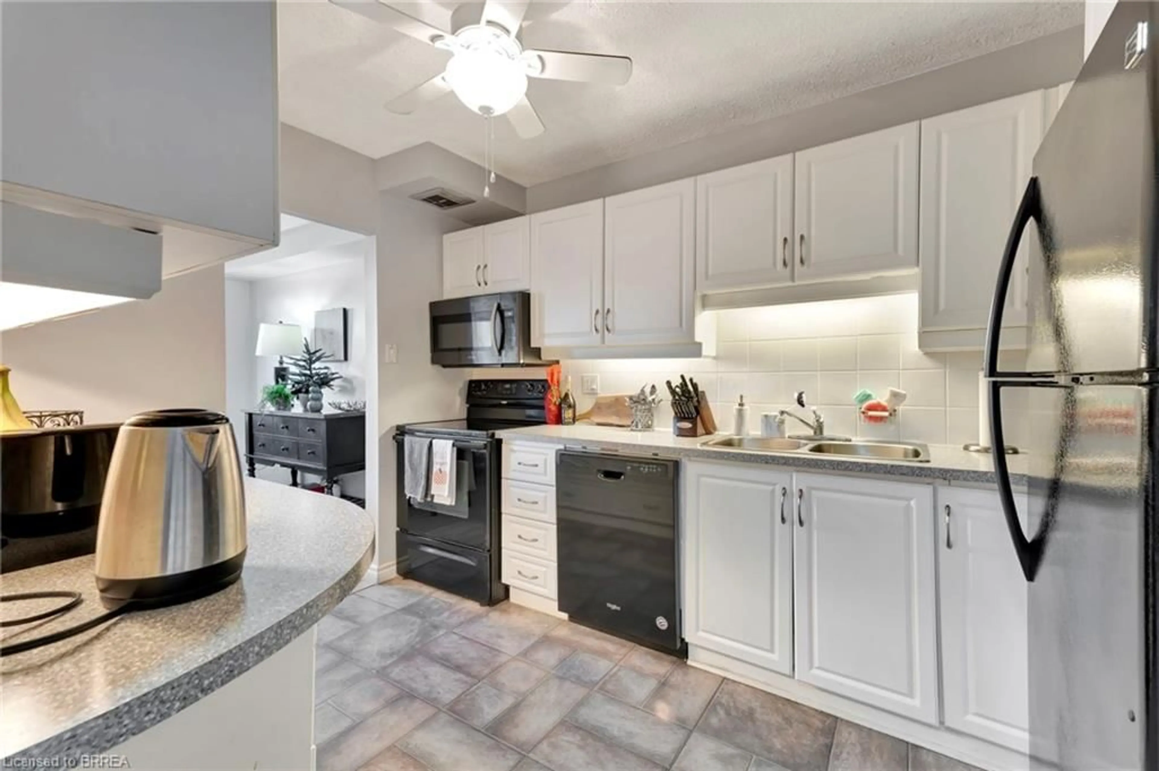 Open concept kitchen, ceramic/tile floor for 640 West St #506, Brantford Ontario N3R 6M3