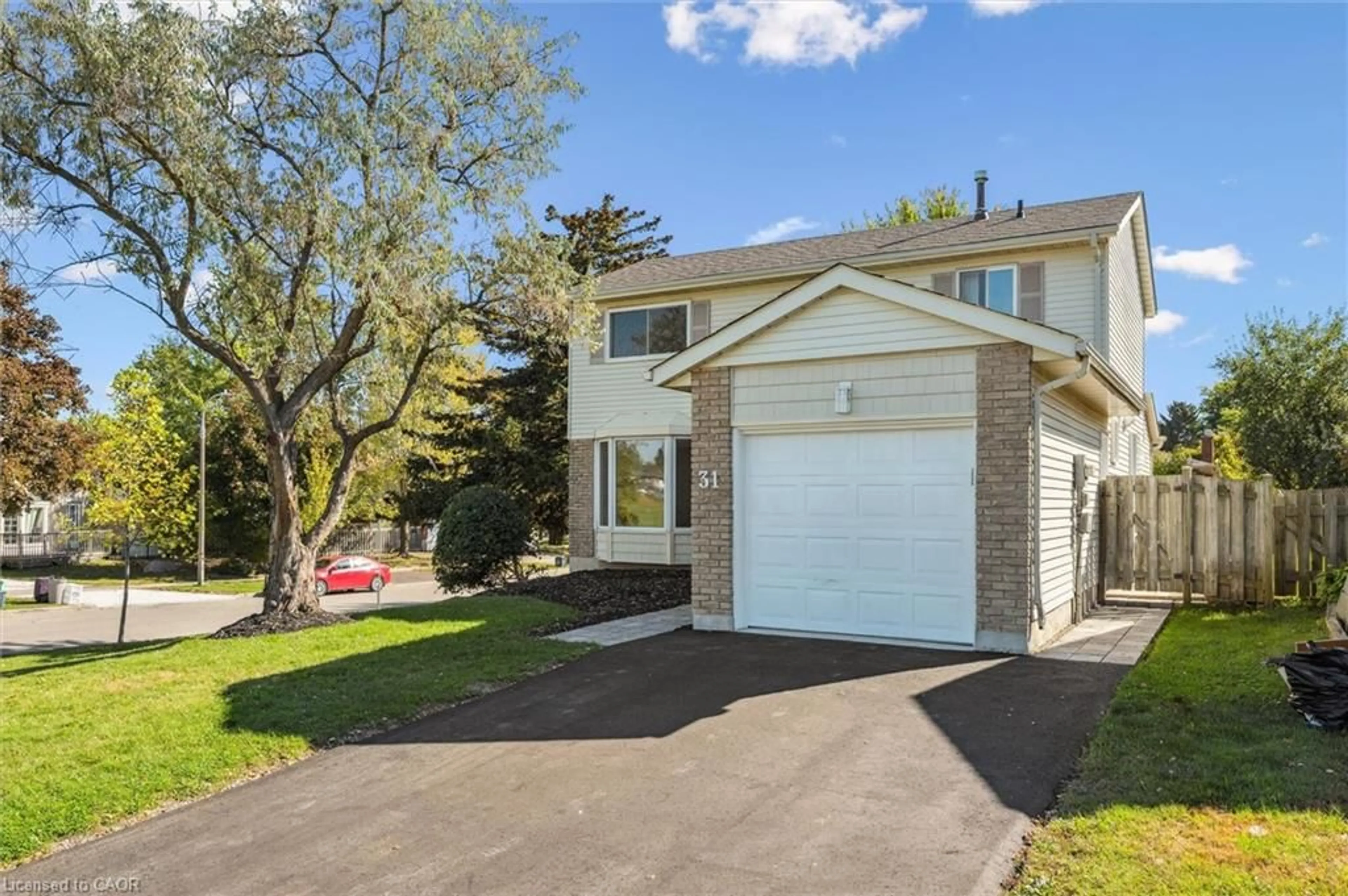 Home with vinyl exterior material, street for 31 Parkland Cres, Kitchener Ontario N2N 1R5
