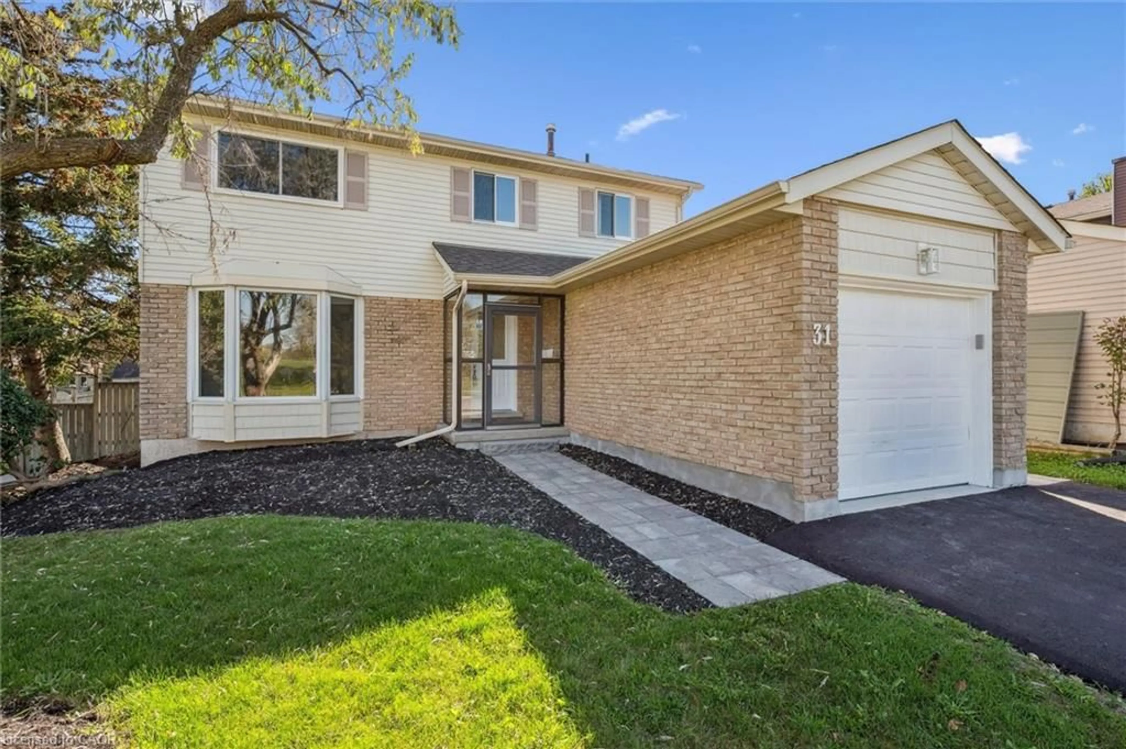 Home with brick exterior material, street for 31 Parkland Cres, Kitchener Ontario N2N 1R5