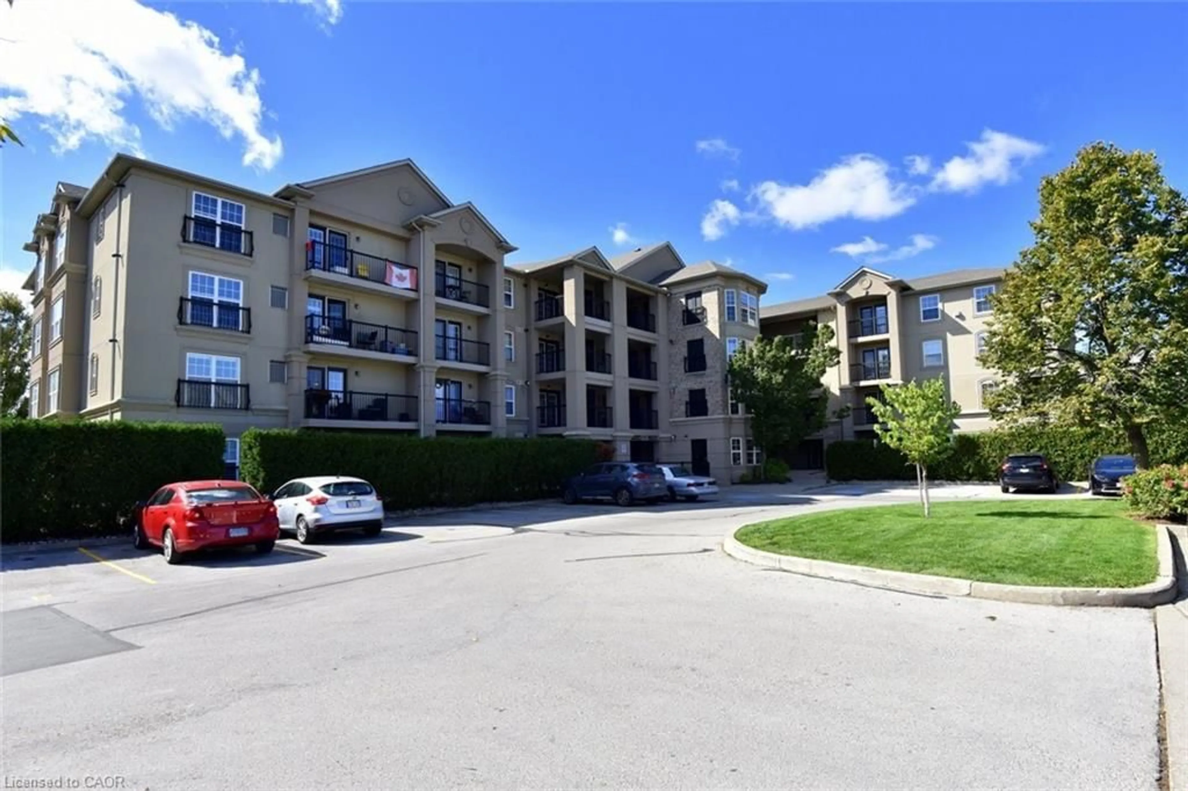 A pic from outside/outdoor area/front of a property/back of a property/a pic from drone, unknown for 2035 Appleby Line #103, Burlington Ontario L7L 7G8