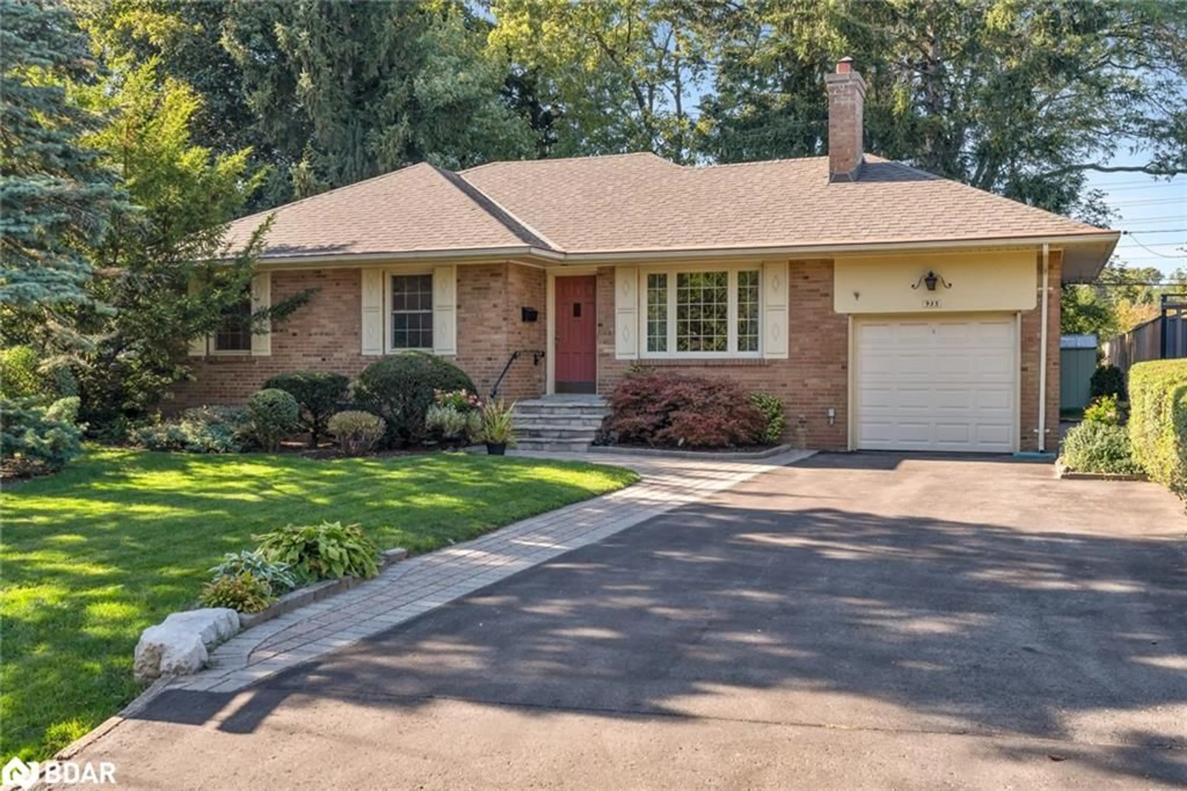 Home with brick exterior material, street for 935 Hedge Dr, Mississauga Ontario L4Y 1E9