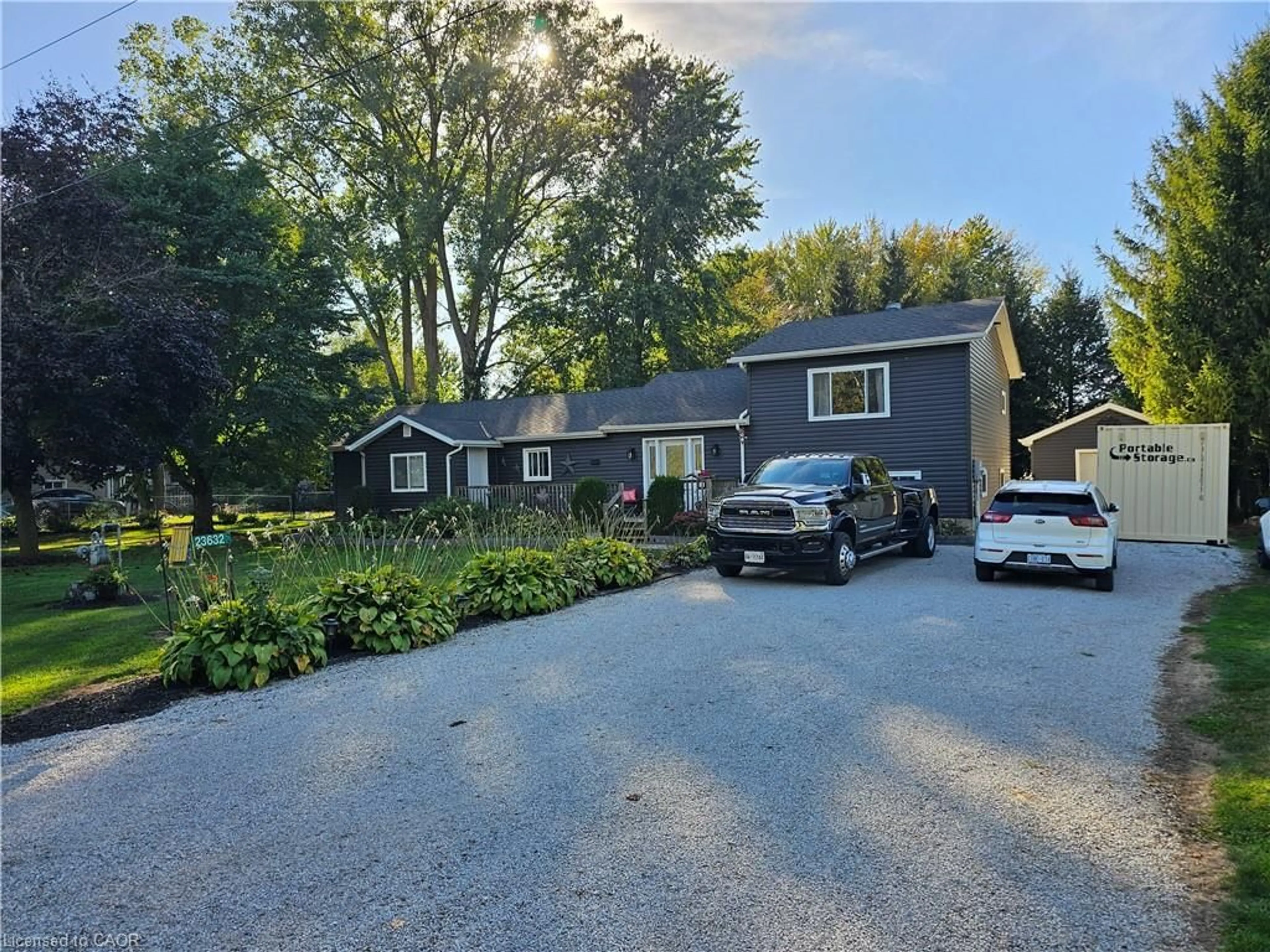 A pic from outside/outdoor area/front of a property/back of a property/a pic from drone, street for 23632 Zone Rd 1, Thamesville Ontario N0P 2K0