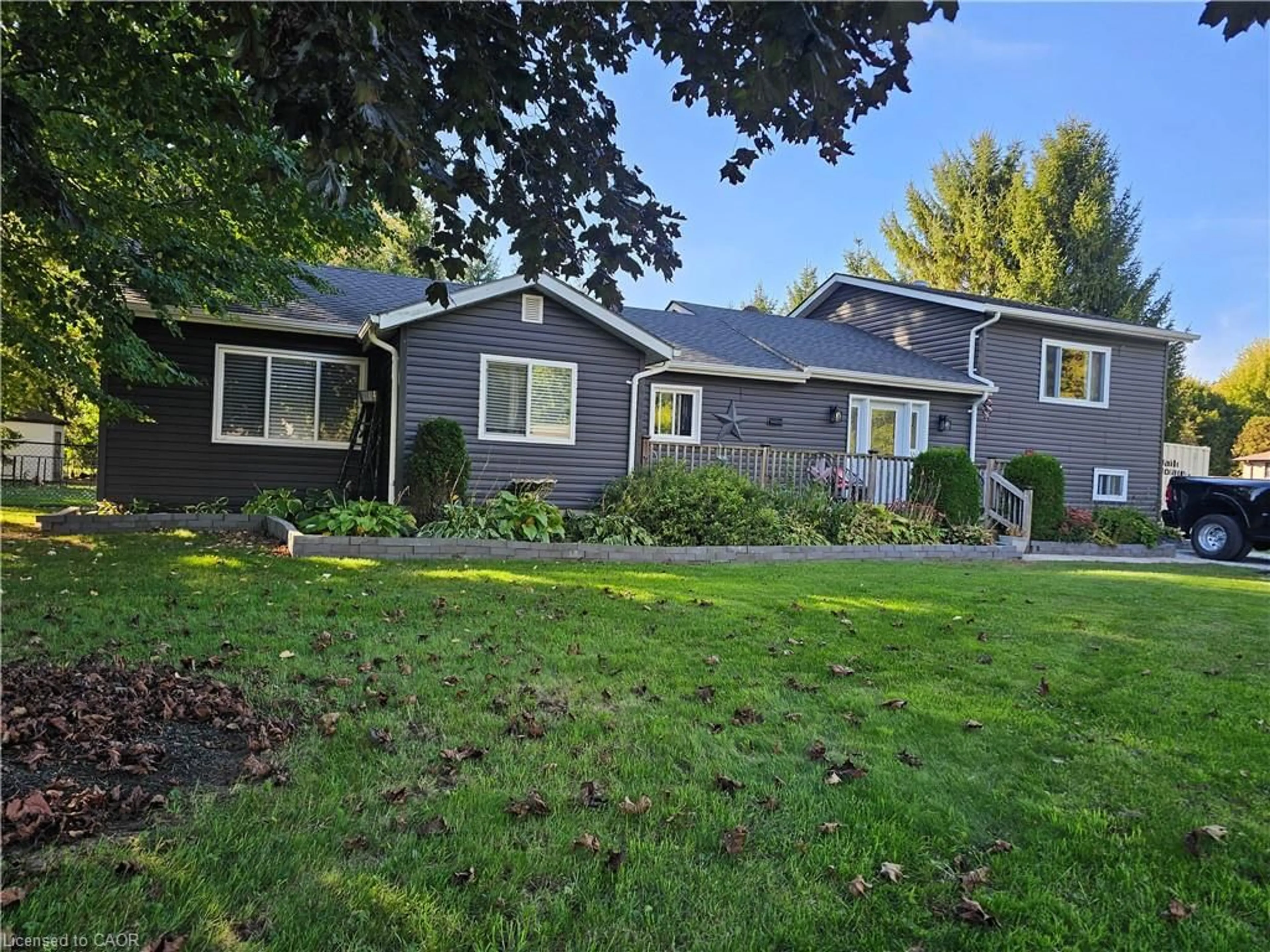 Home with vinyl exterior material, street for 23632 Zone Rd 1, Thamesville Ontario N0P 2K0