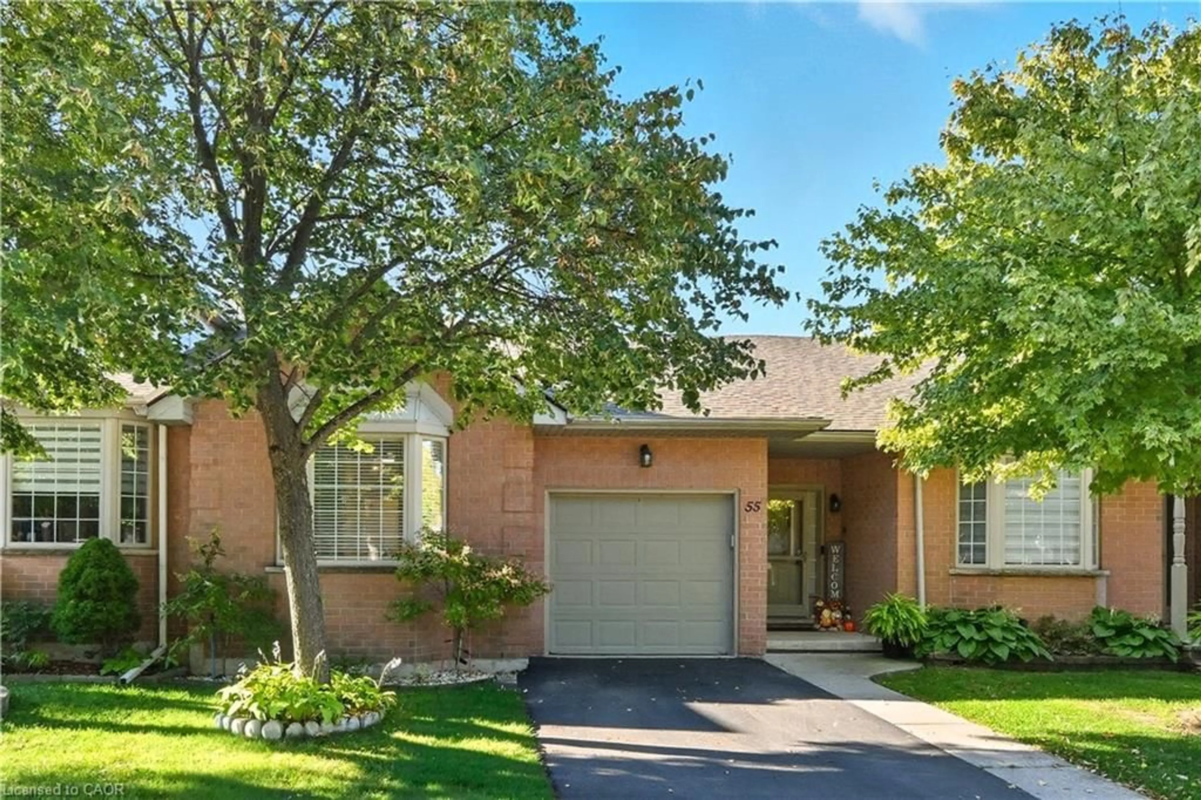 Home with brick exterior material, street for 55 Northern Breeze St #33, Hamilton Ontario L0R 1W0