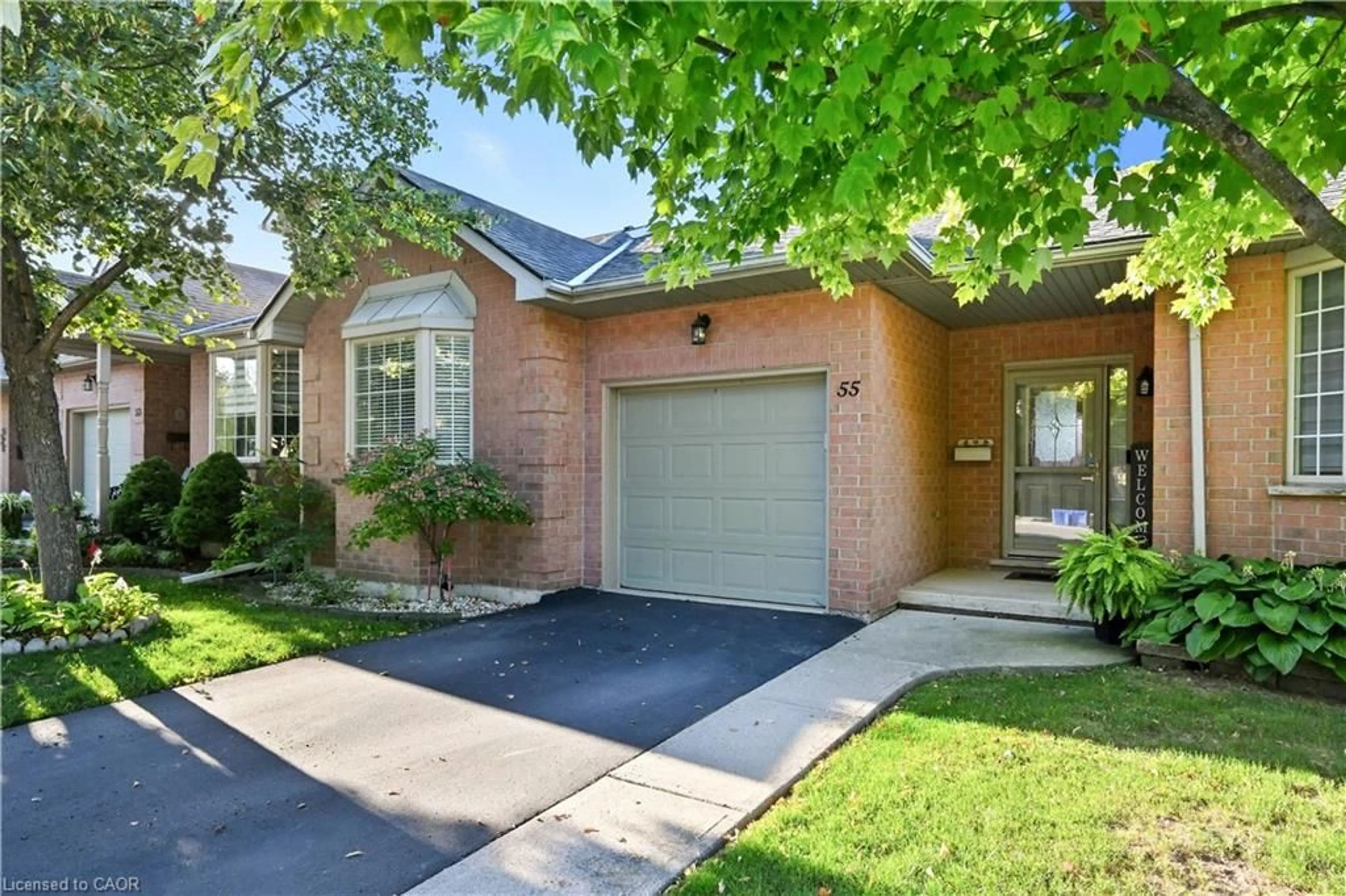Home with brick exterior material, street for 55 Northern Breeze St #33, Hamilton Ontario L0R 1W0