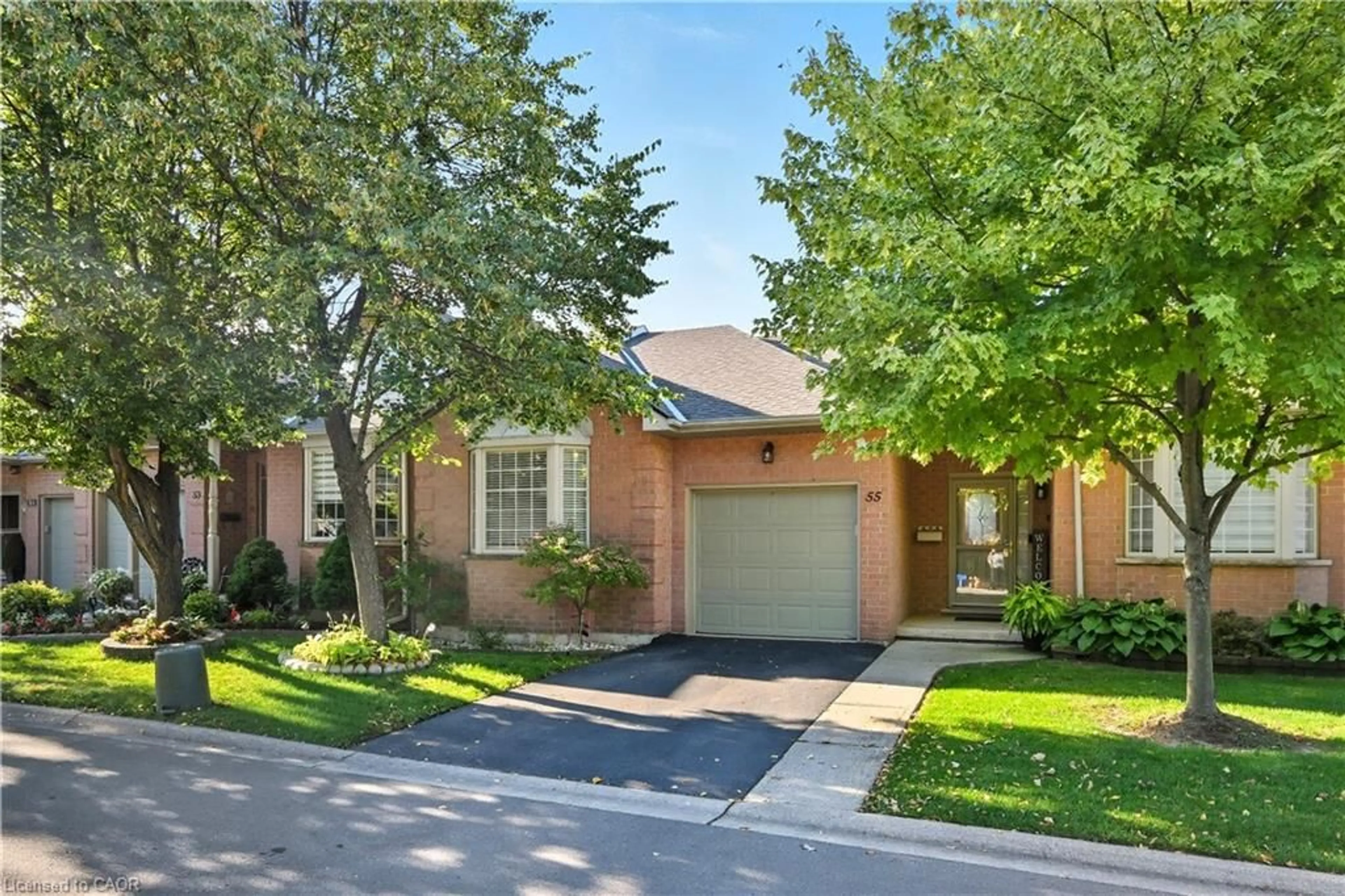 Home with brick exterior material, street for 55 Northern Breeze St #33, Hamilton Ontario L0R 1W0