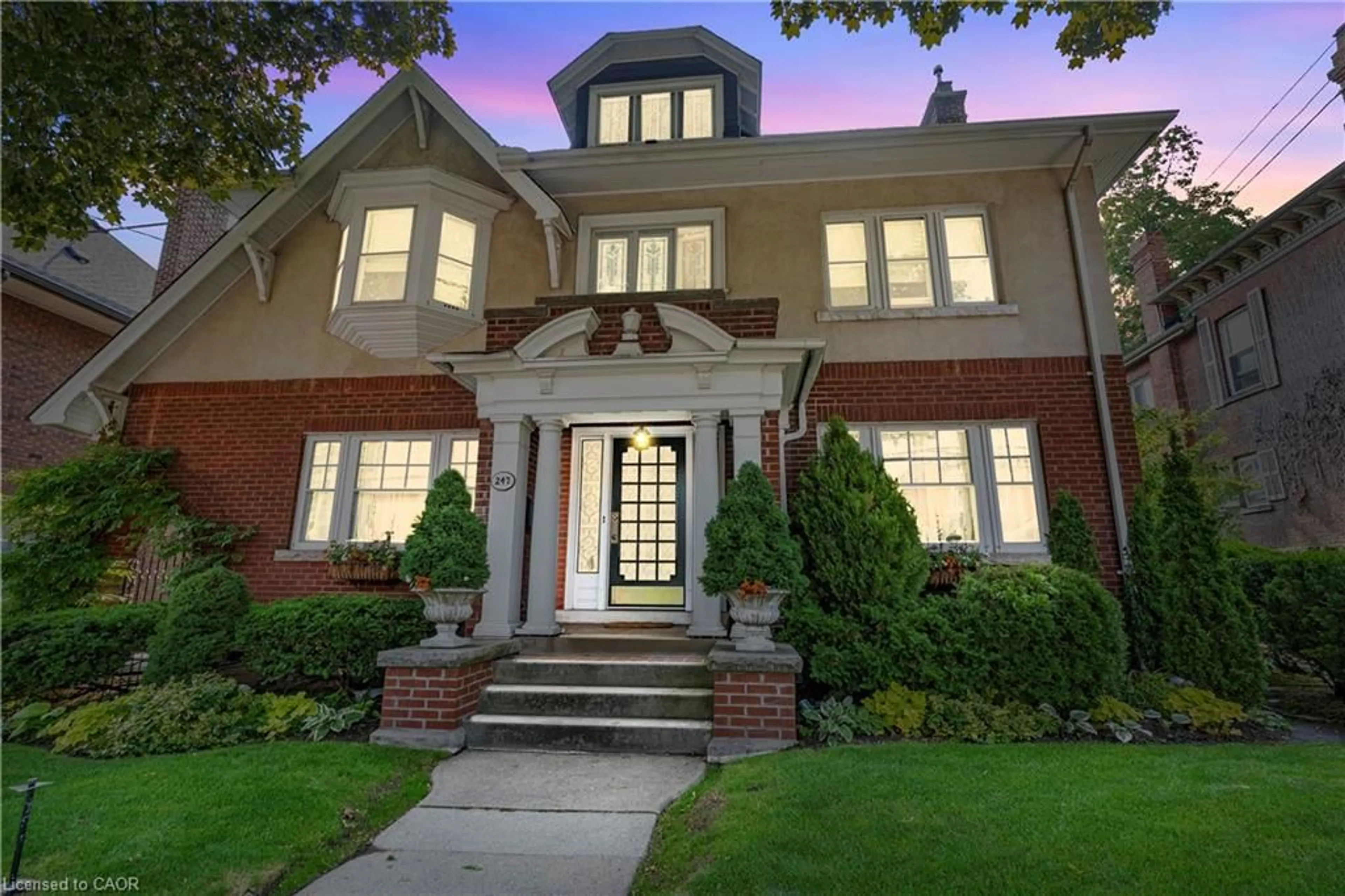 Home with brick exterior material, street for 247 Macnab St, Hamilton Ontario L8P 3E2