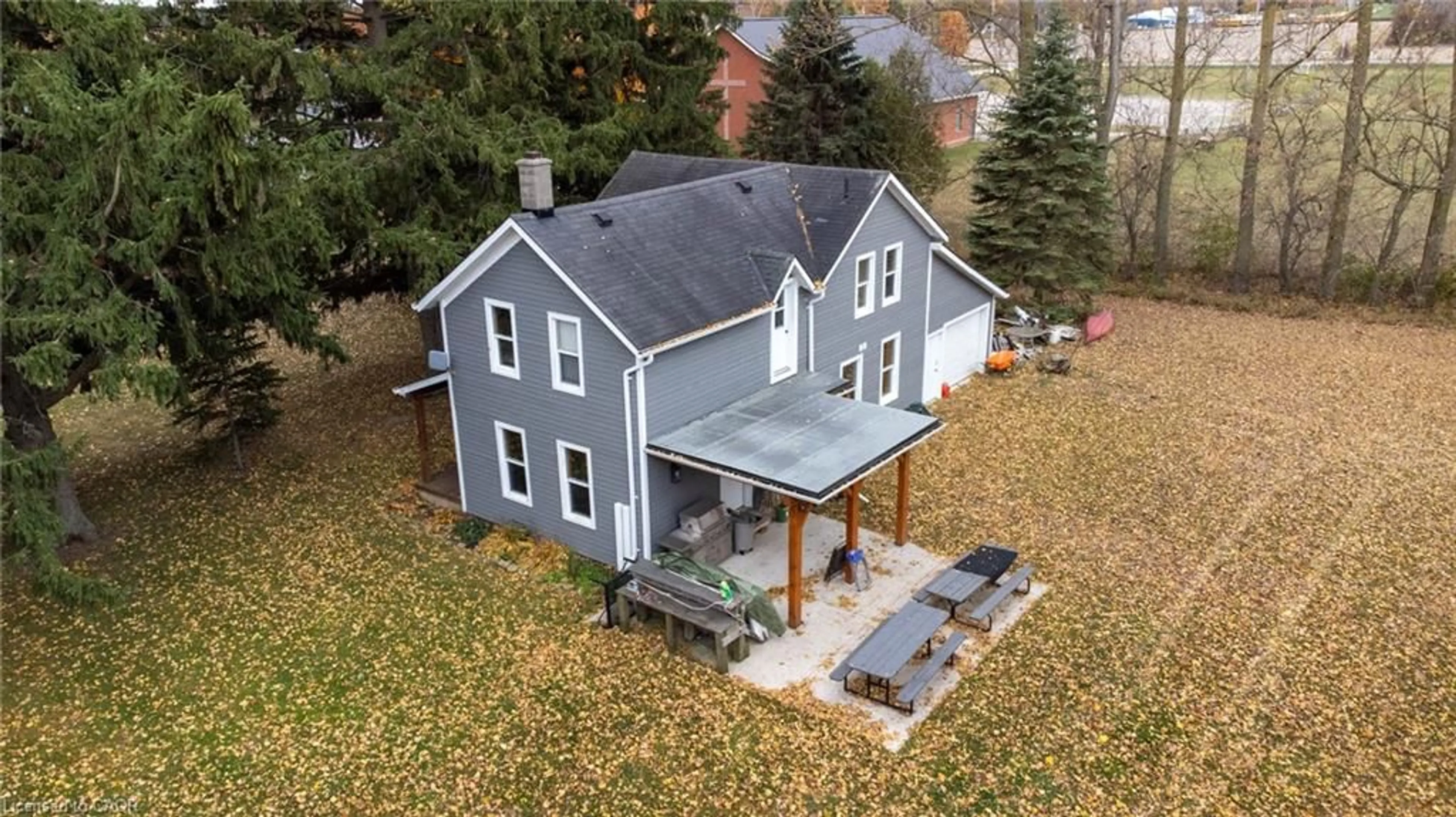 A pic from outside/outdoor area/front of a property/back of a property/a pic from drone, building for 86561 London Rd, North Huron (Twp) Ontario N0G 2W0
