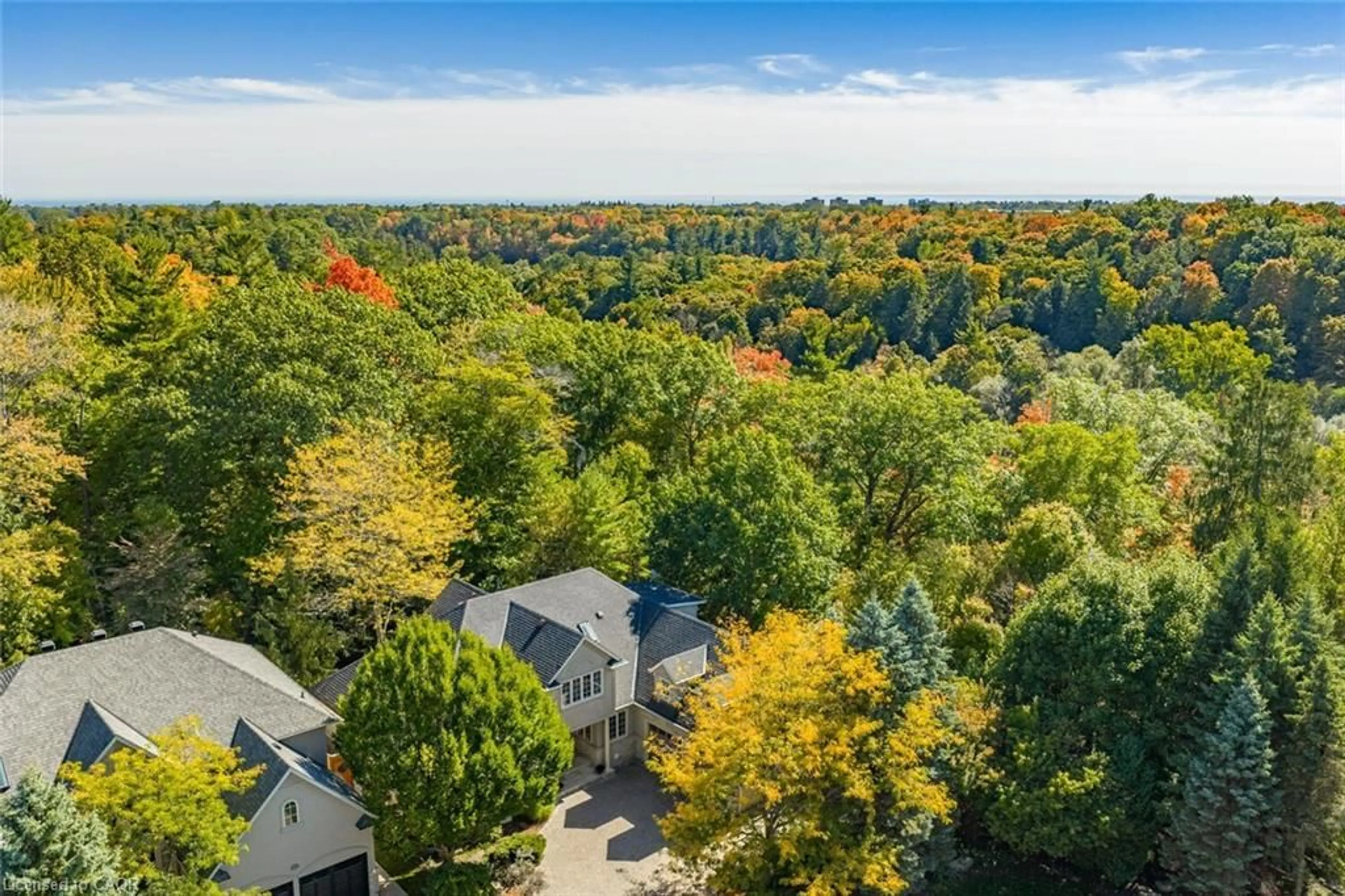 A pic from outside/outdoor area/front of a property/back of a property/a pic from drone, forest/trees view for 1227 Riverbank Way, Oakville Ontario L6H 6X4