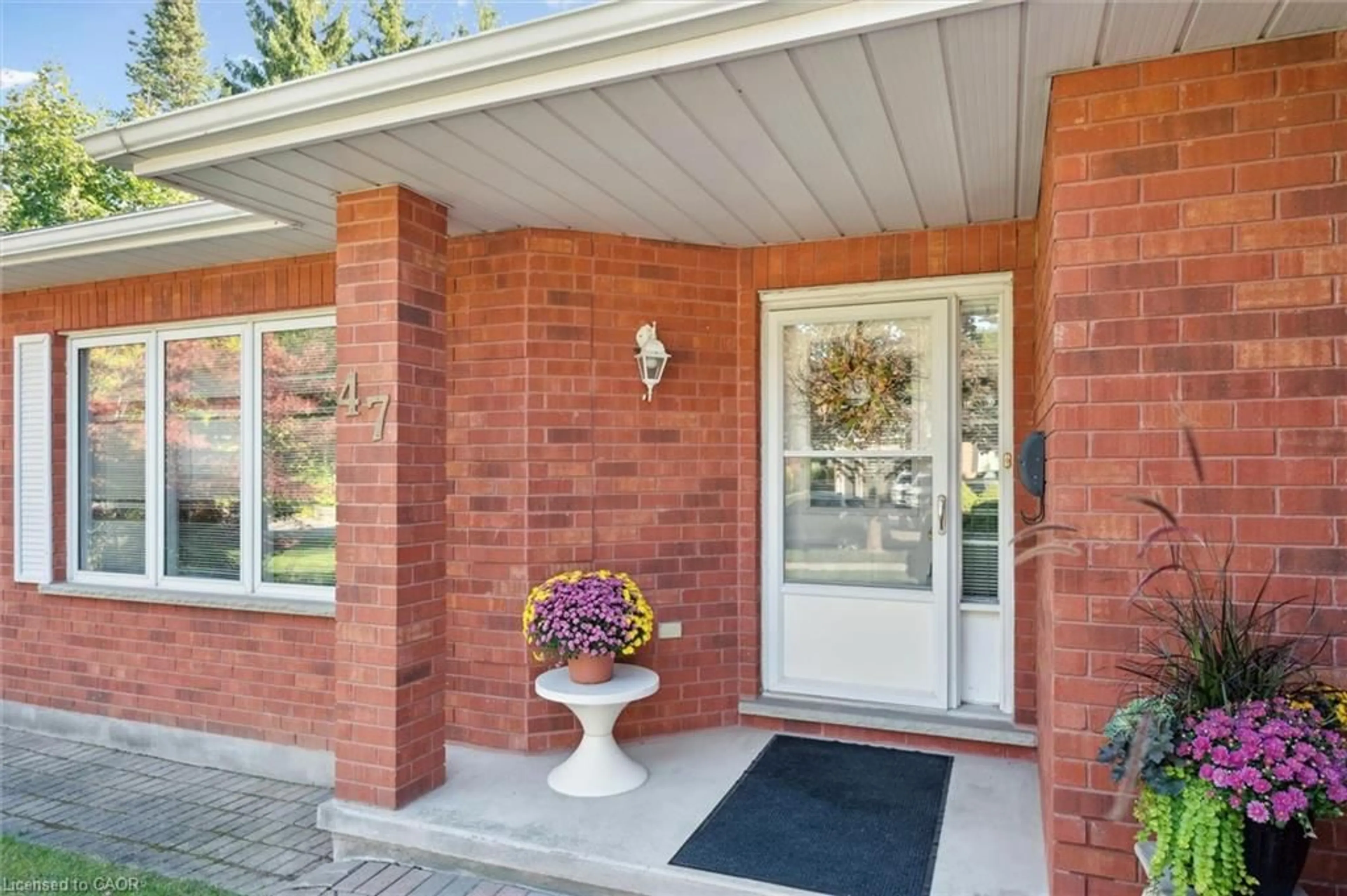 Home with brick exterior material, street for 47 Corfield Dr, Kitchener Ontario N2A 3W8