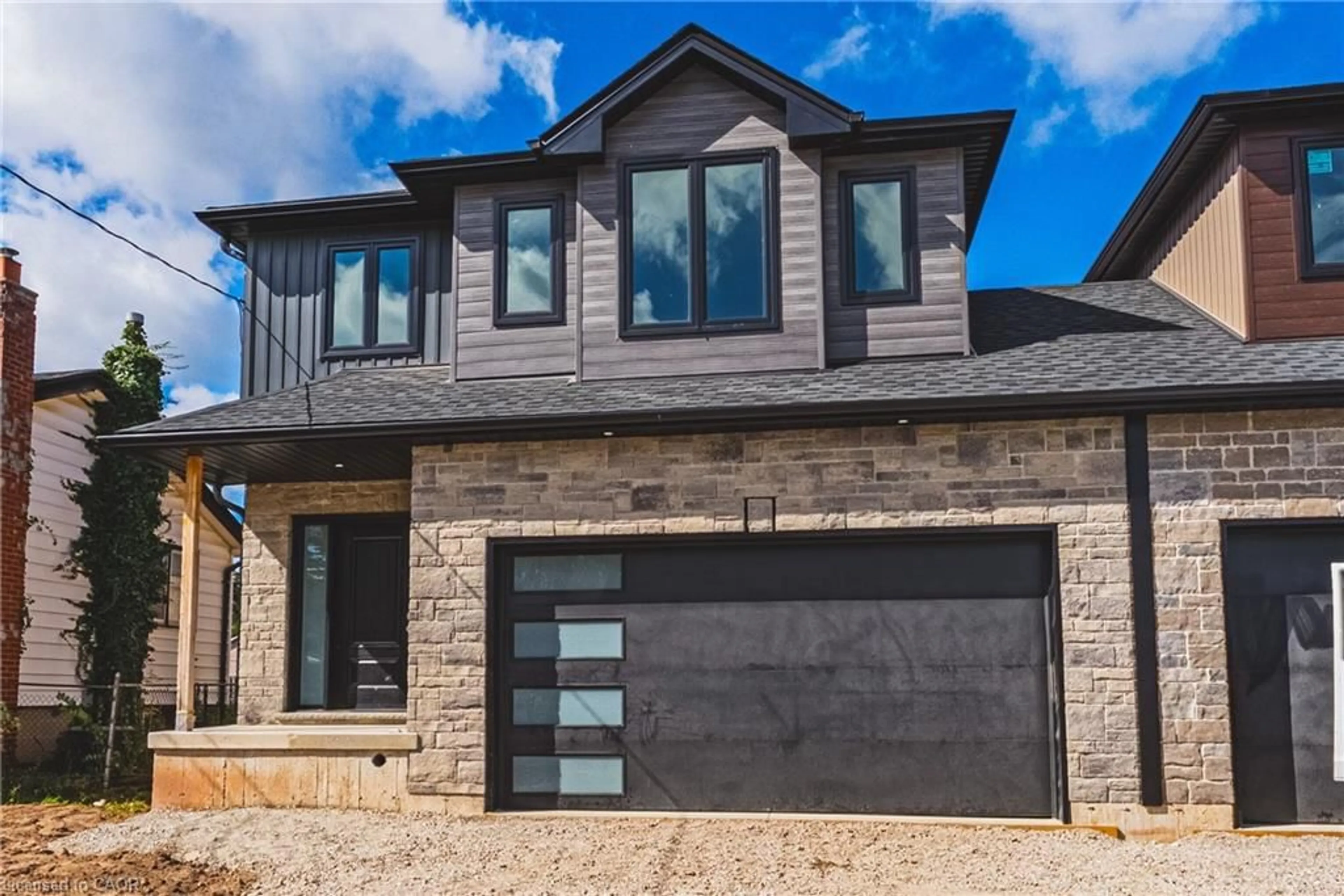 Home with brick exterior material, street for 39 Norwich Rd, Stoney Creek Ontario L8E 1Z7