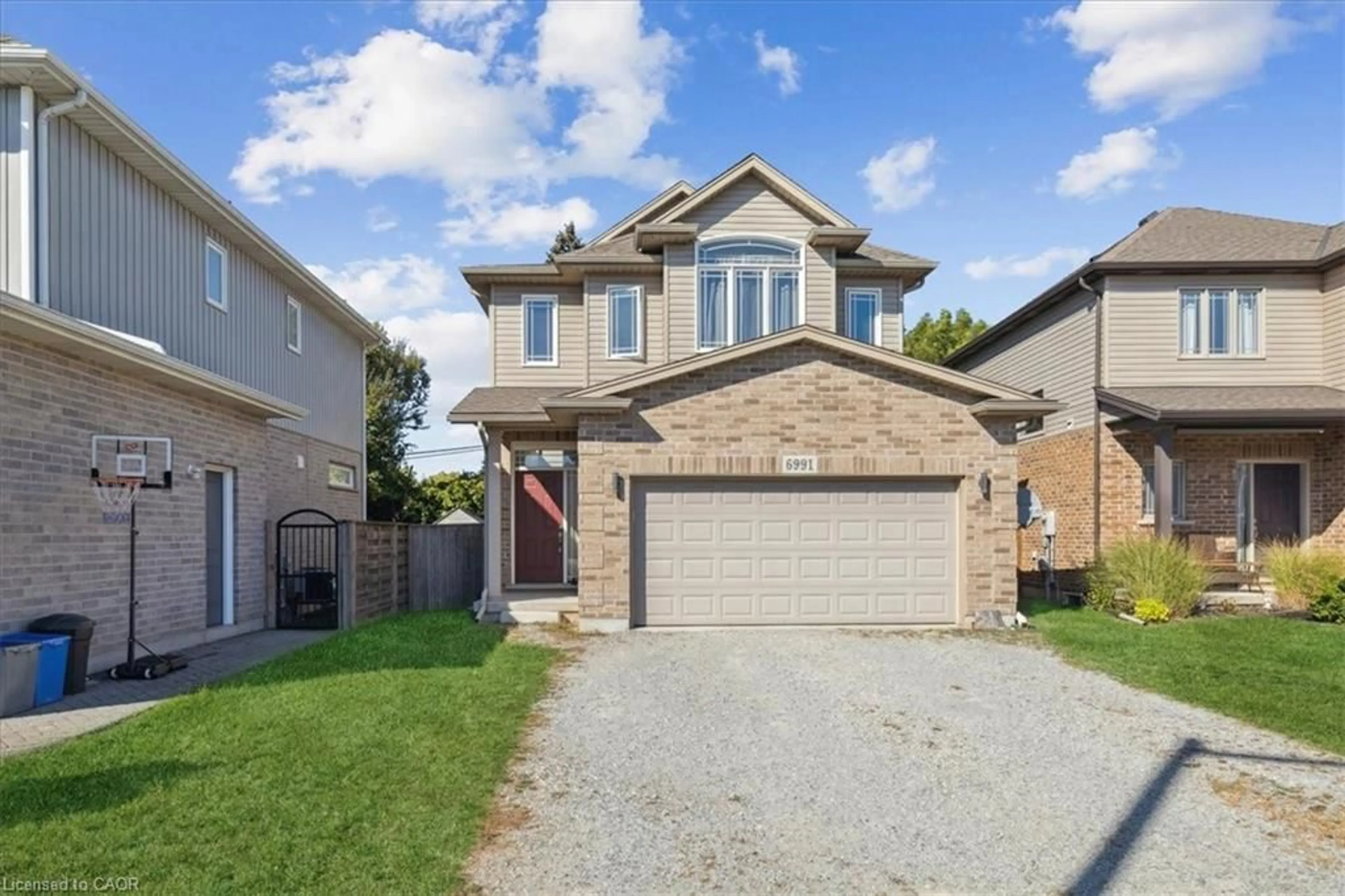 Home with brick exterior material, street for 6991 Optimist Lane, Niagara Falls Ontario L2E 0B1