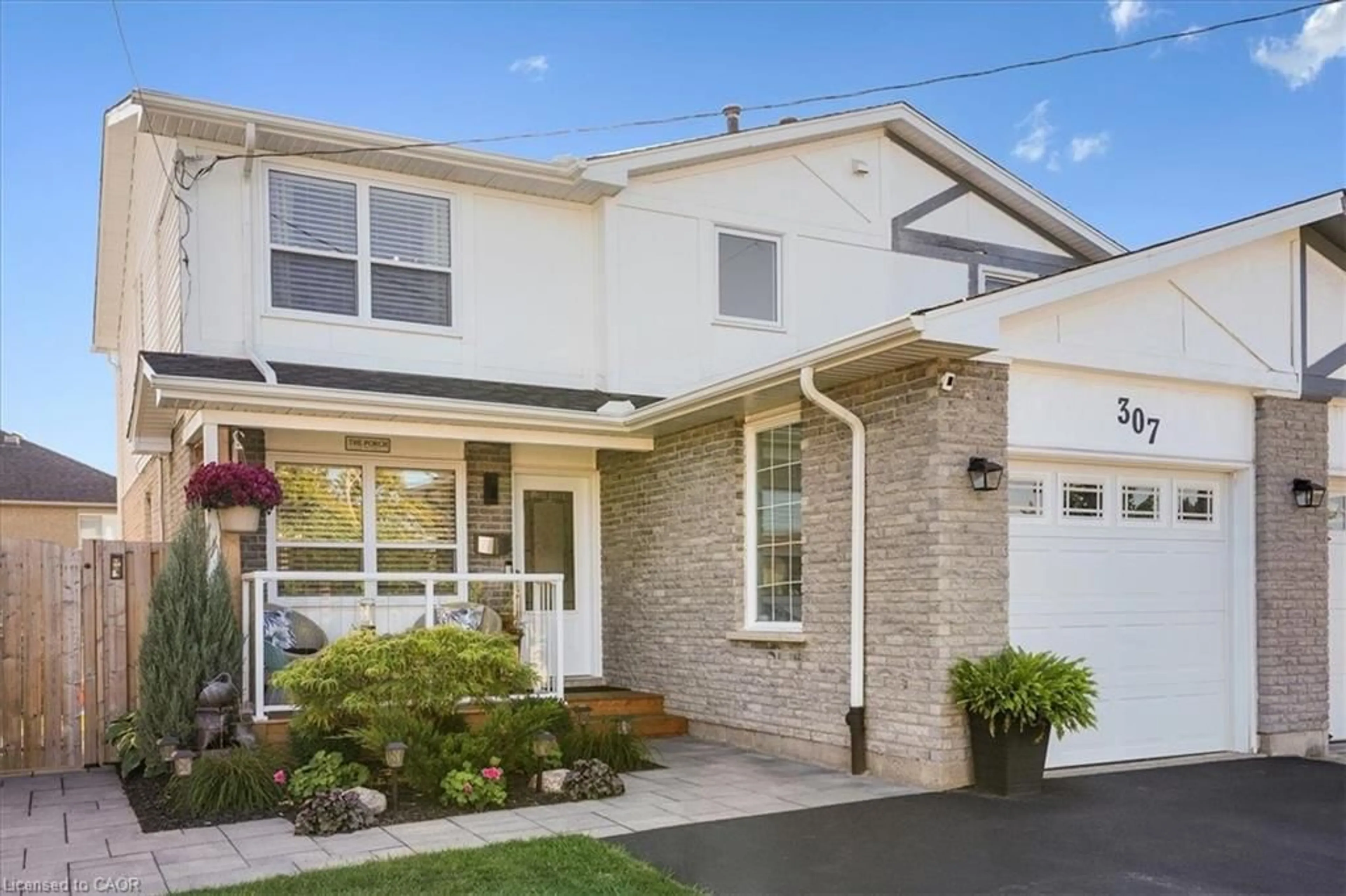 Home with vinyl exterior material, street for 307 Highridge Ave, Hamilton Ontario L8E 3W1