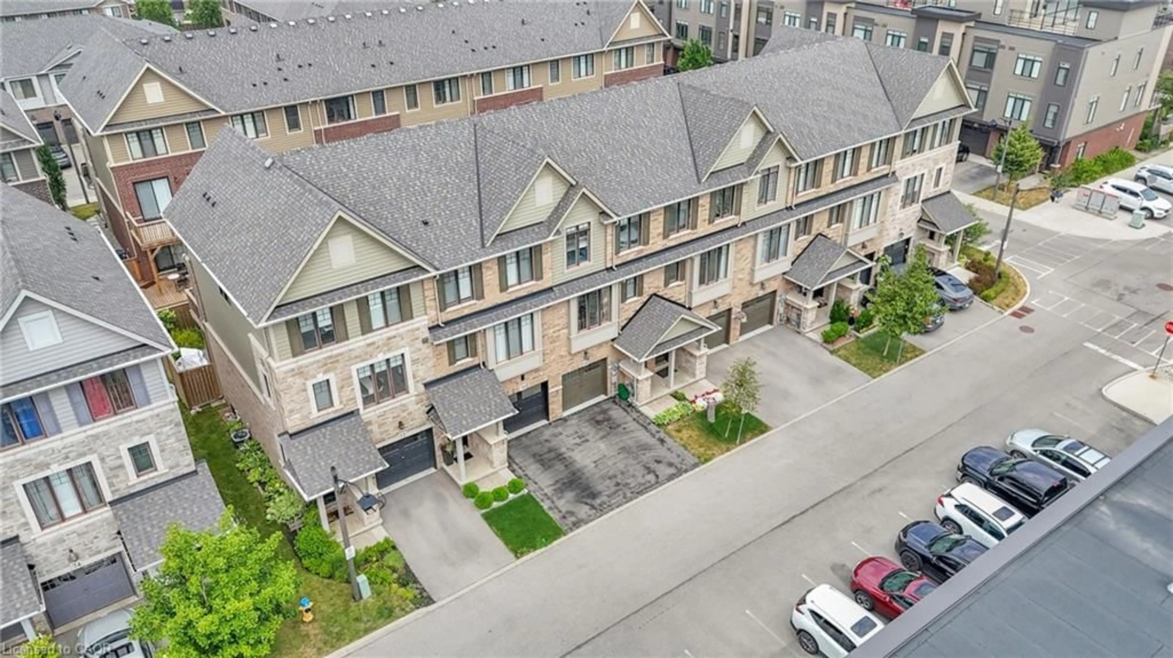 A pic from outside/outdoor area/front of a property/back of a property/a pic from drone, street for 68 Esplanade Lane, Grimsby Ontario L3M 0H2