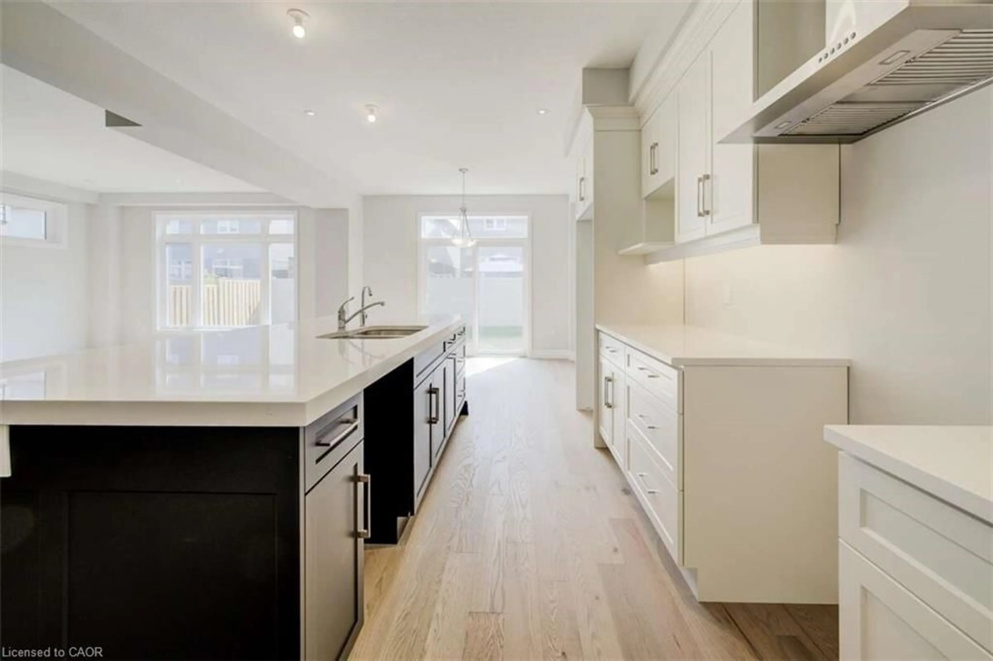 Open concept kitchen, wood/laminate floor for 83 Crosswinds Dr, Kitchener Ontario N2A 0J9