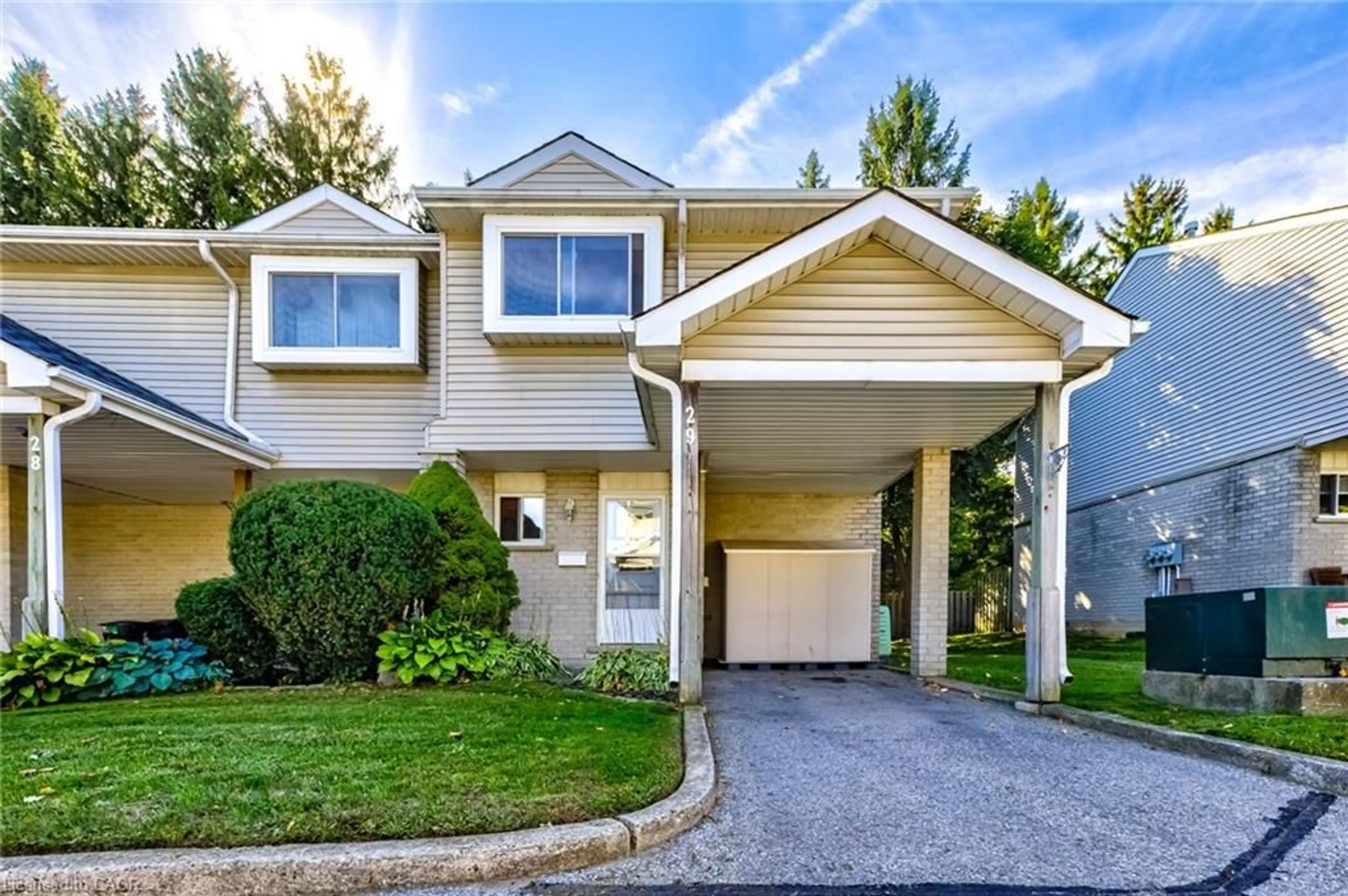 Home with vinyl exterior material, street for 125 Sekura Cres #29, Cambridge Ontario N1R 8B4