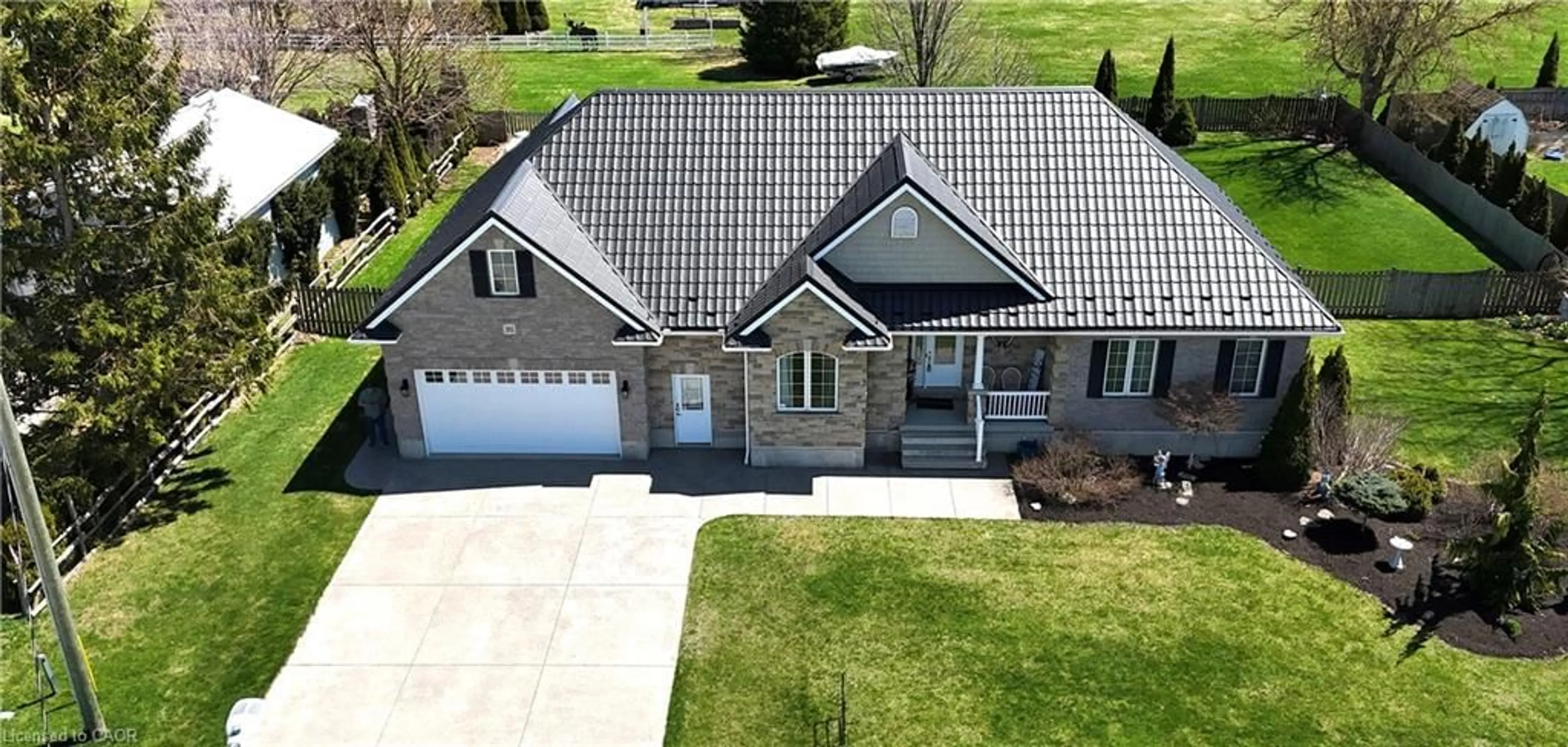 A pic from outside/outdoor area/front of a property/back of a property/a pic from drone, street for 161 Brock St, Monkton Ontario N0K 1P0