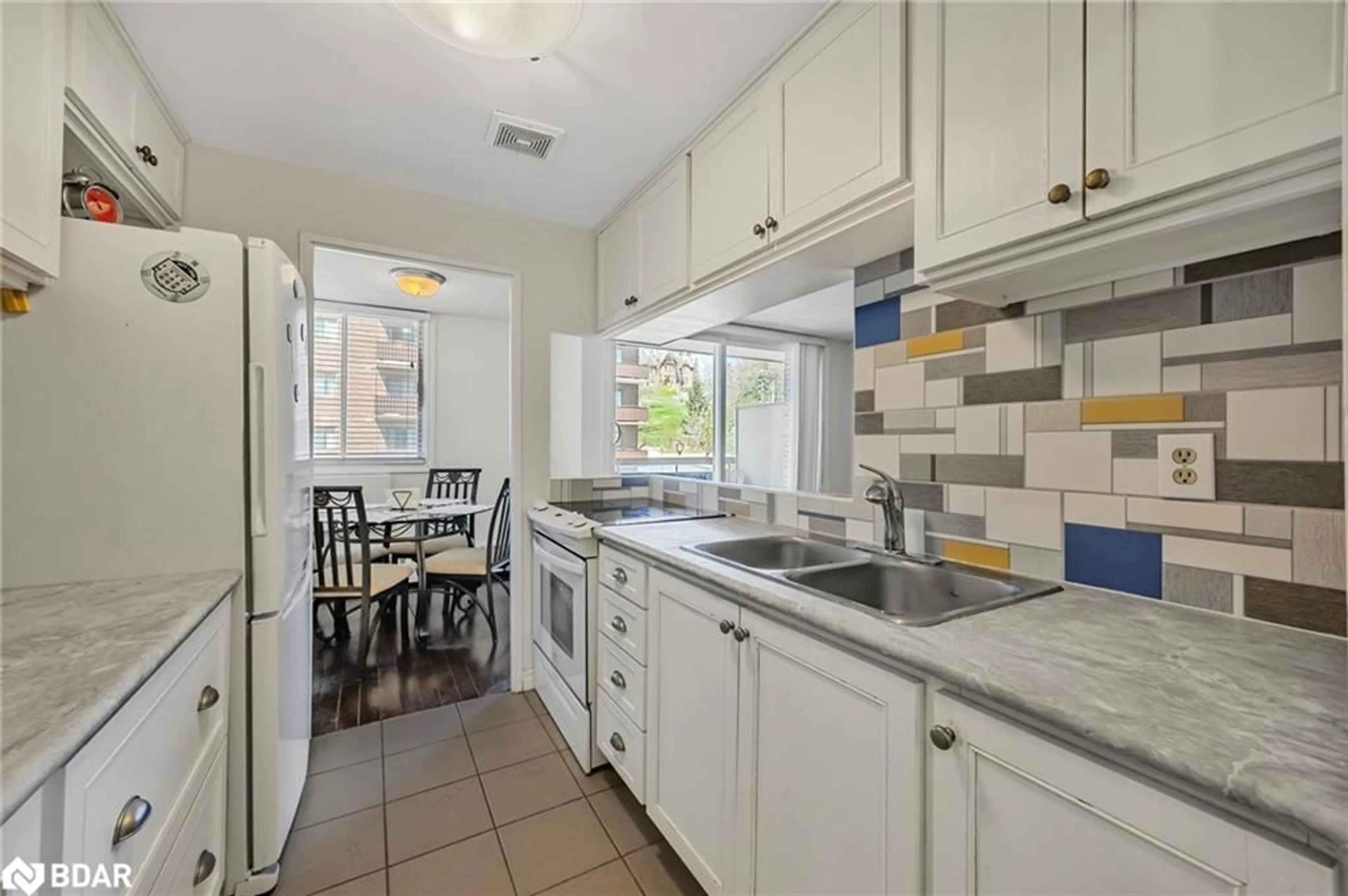 Standard kitchen, ceramic/tile floor for 2 Albert St #32, Barrie Ontario L4M 3S4