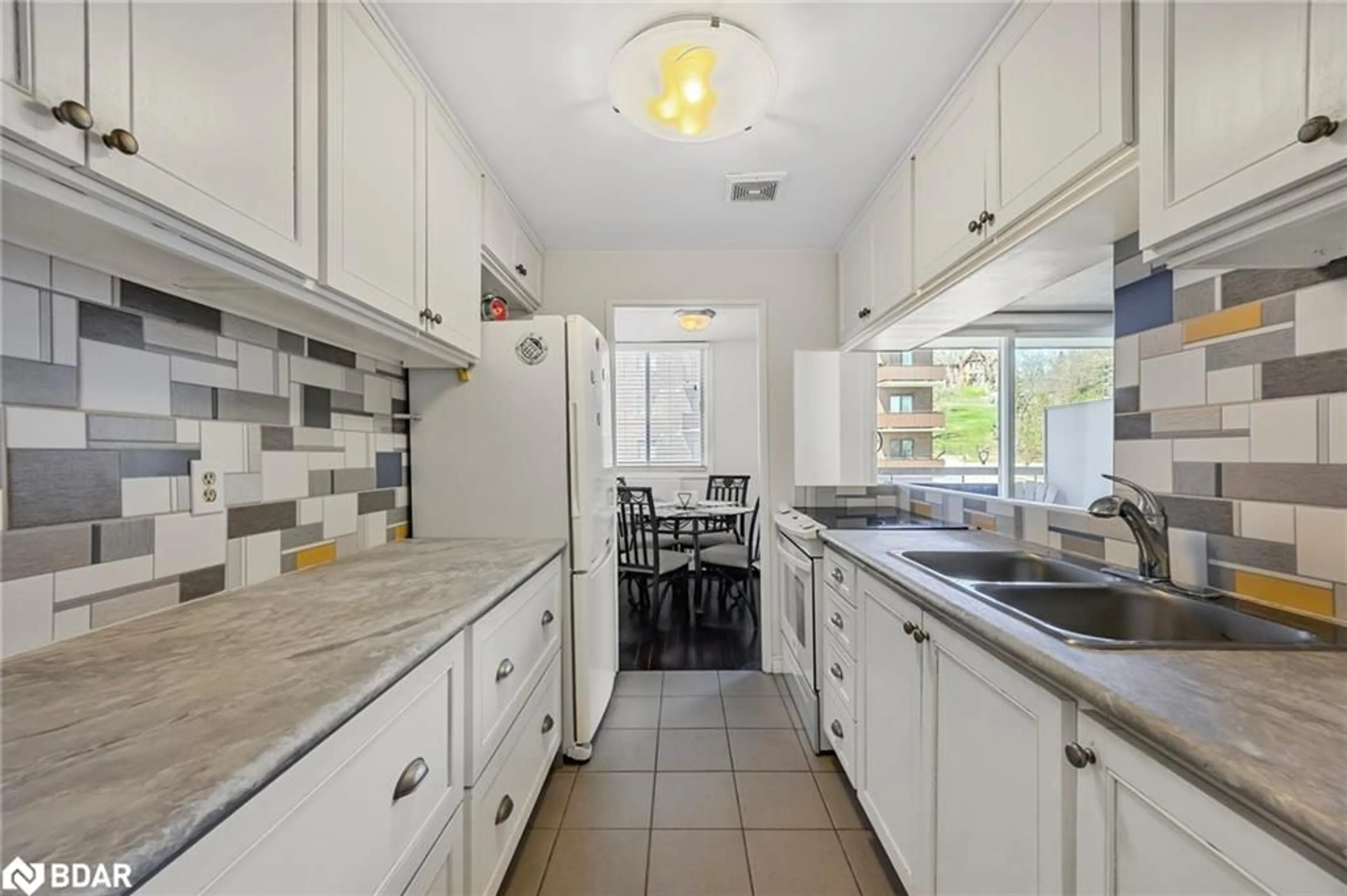 Standard kitchen, ceramic/tile floor for 2 Albert St #32, Barrie Ontario L4M 3S4