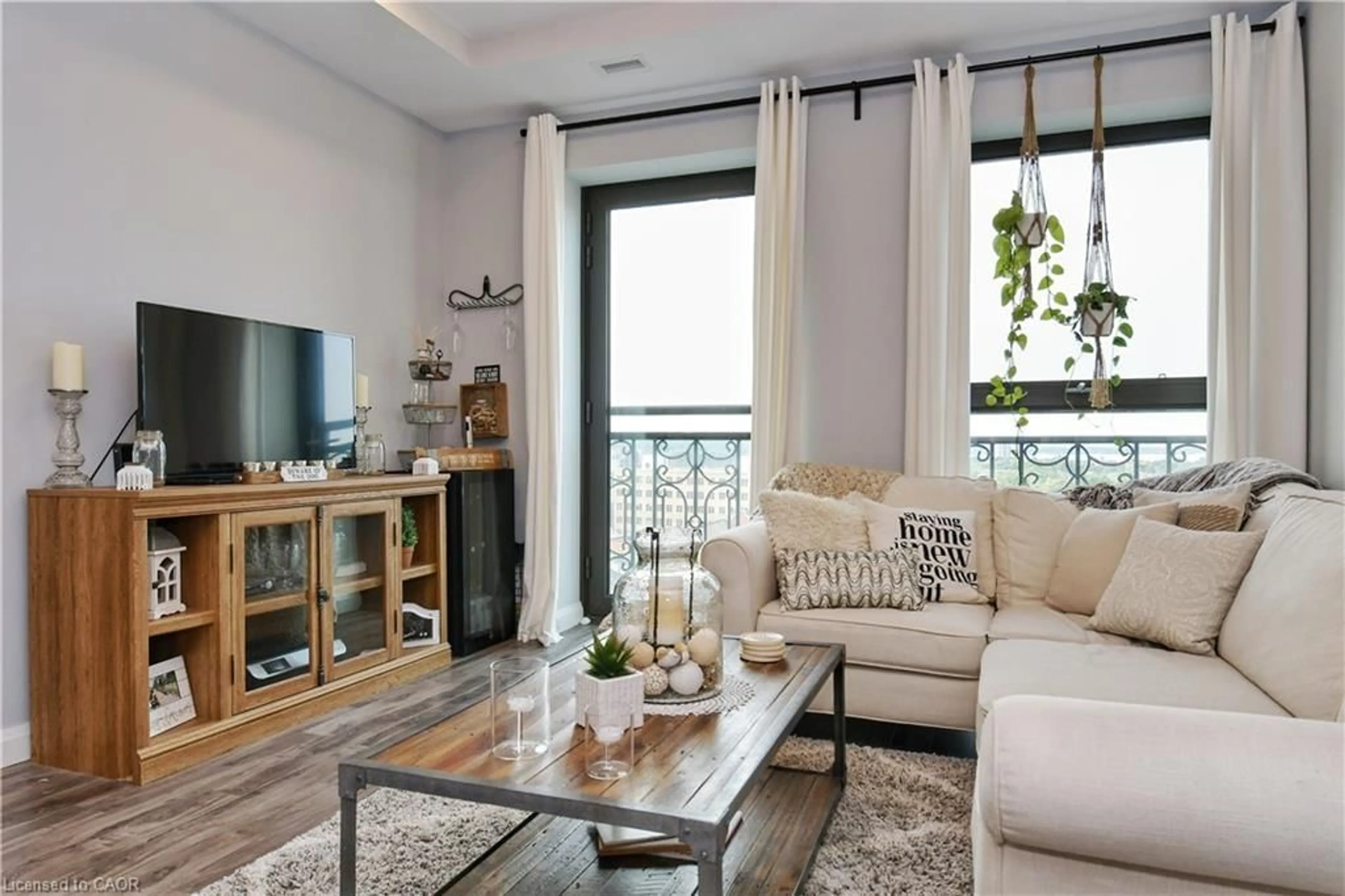 Living room with furniture, unknown for 112 King St #903, Hamilton Ontario L8N 1A8