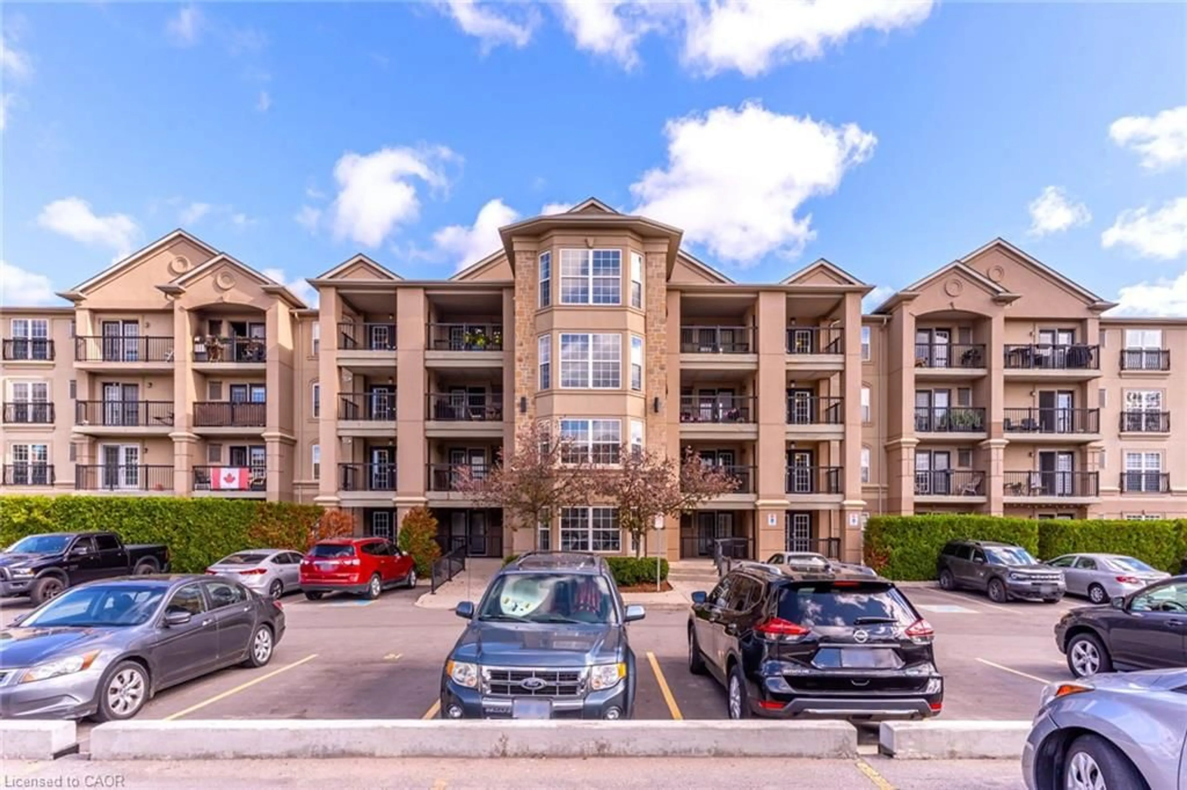 A pic from outside/outdoor area/front of a property/back of a property/a pic from drone, unknown for 2065 Appleby Line #402, Burlington Ontario L7L 7H2