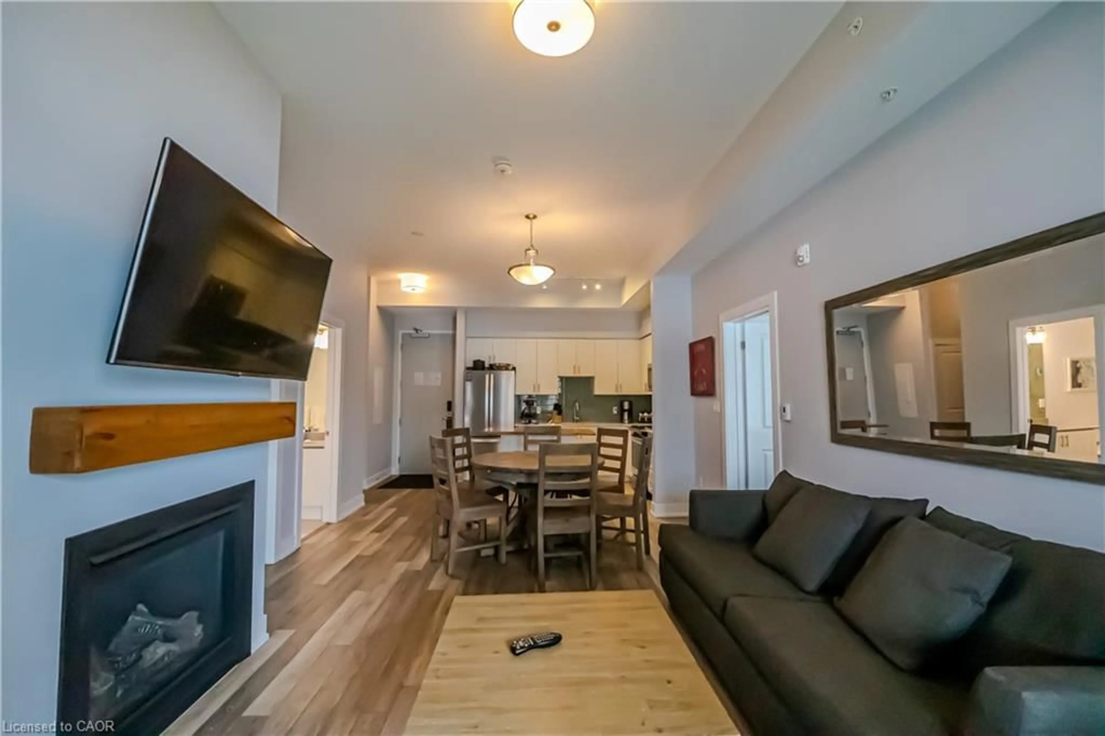 Living room with furniture, wood/laminate floor for 25 Pen Lake Point Rd #031, Huntsville Ontario P1H 1A9