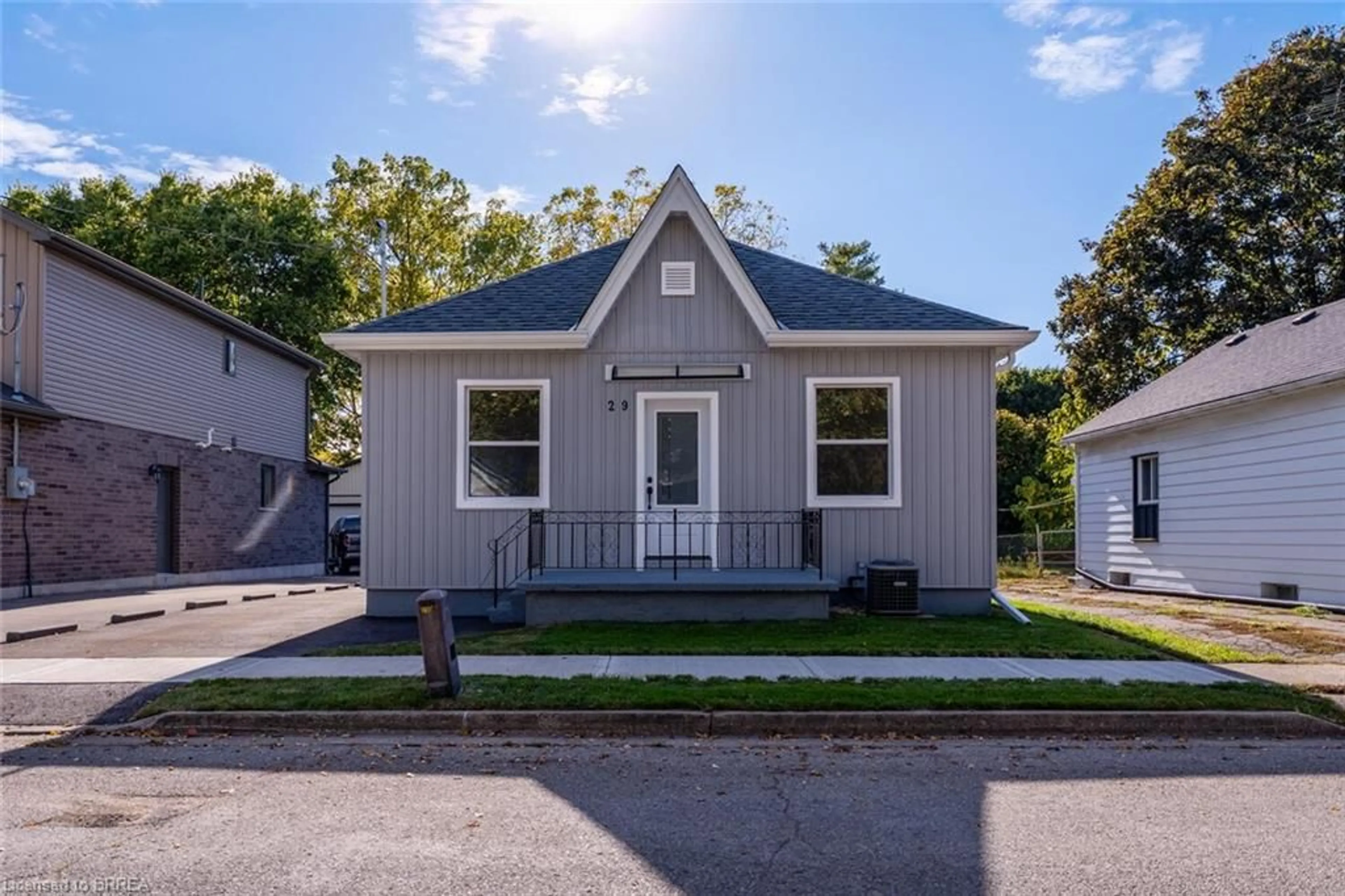 Home with vinyl exterior material, street for 29 Wade Ave, Brantford Ontario N3T 1W9