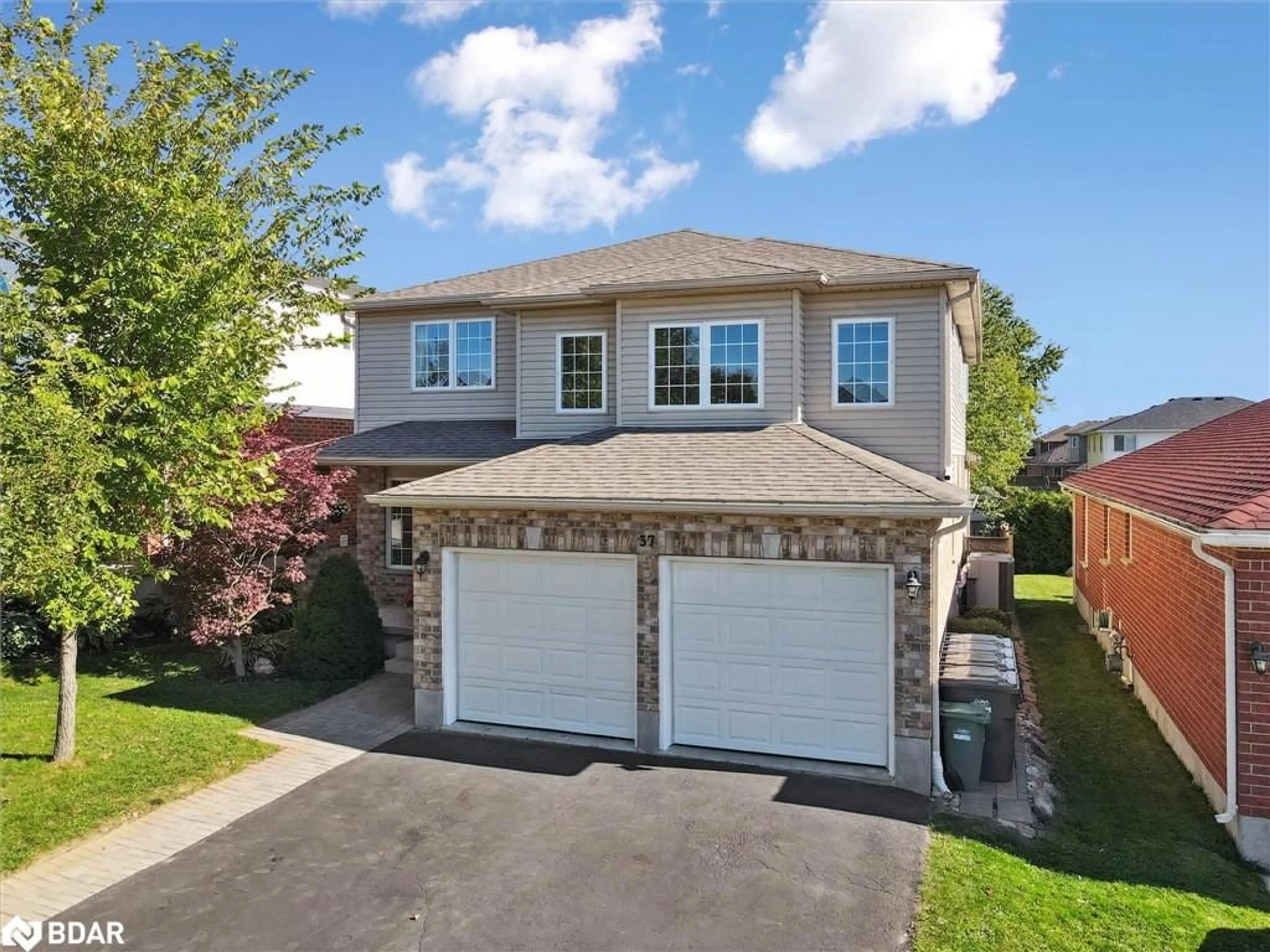 Home with brick exterior material, street for 37 Shackleton Dr, Guelph Ontario N1E 7L3