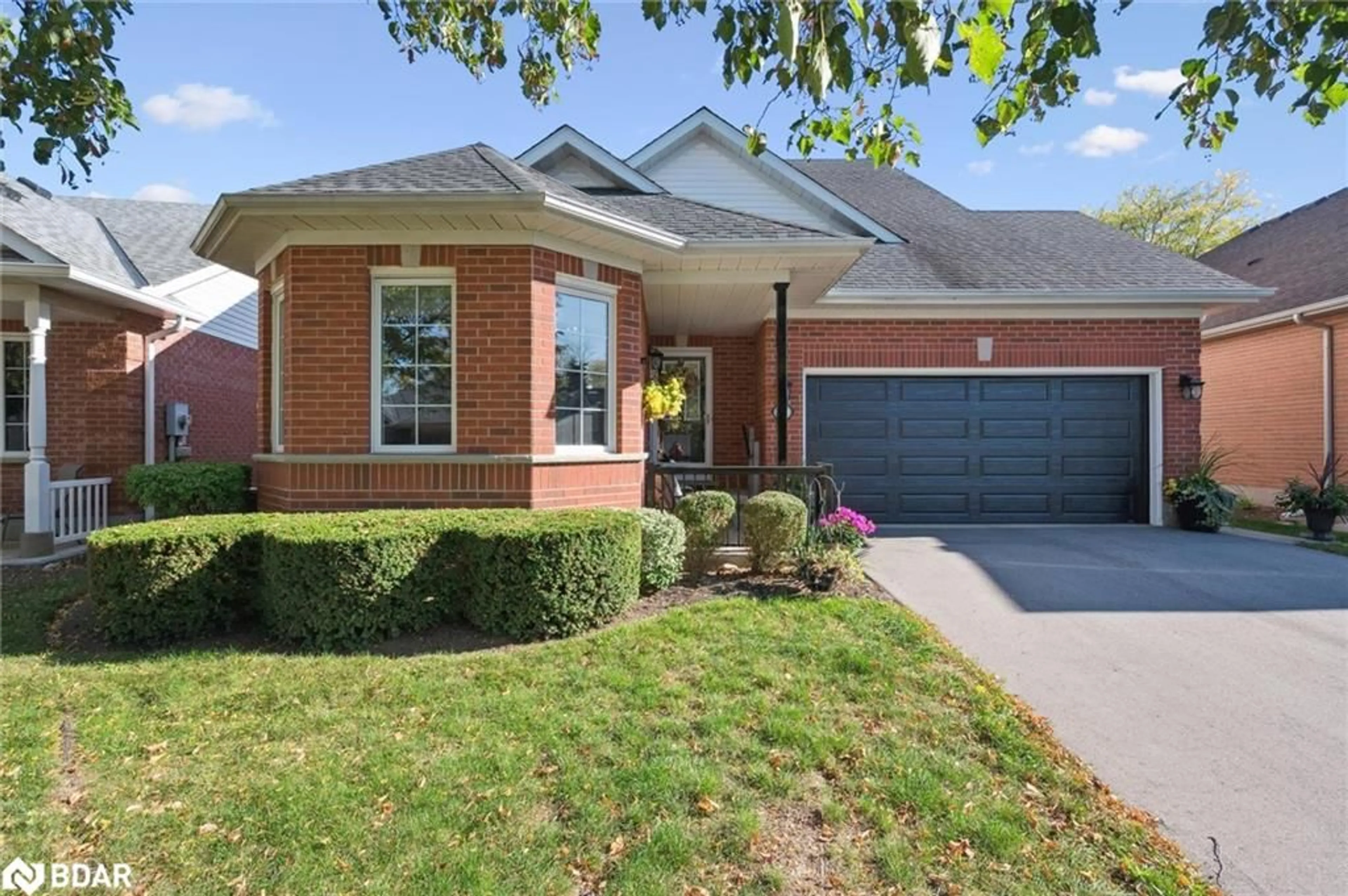 Home with brick exterior material, street for 21 Cherry Blossom Circle, Guelph Ontario N1G 4X7