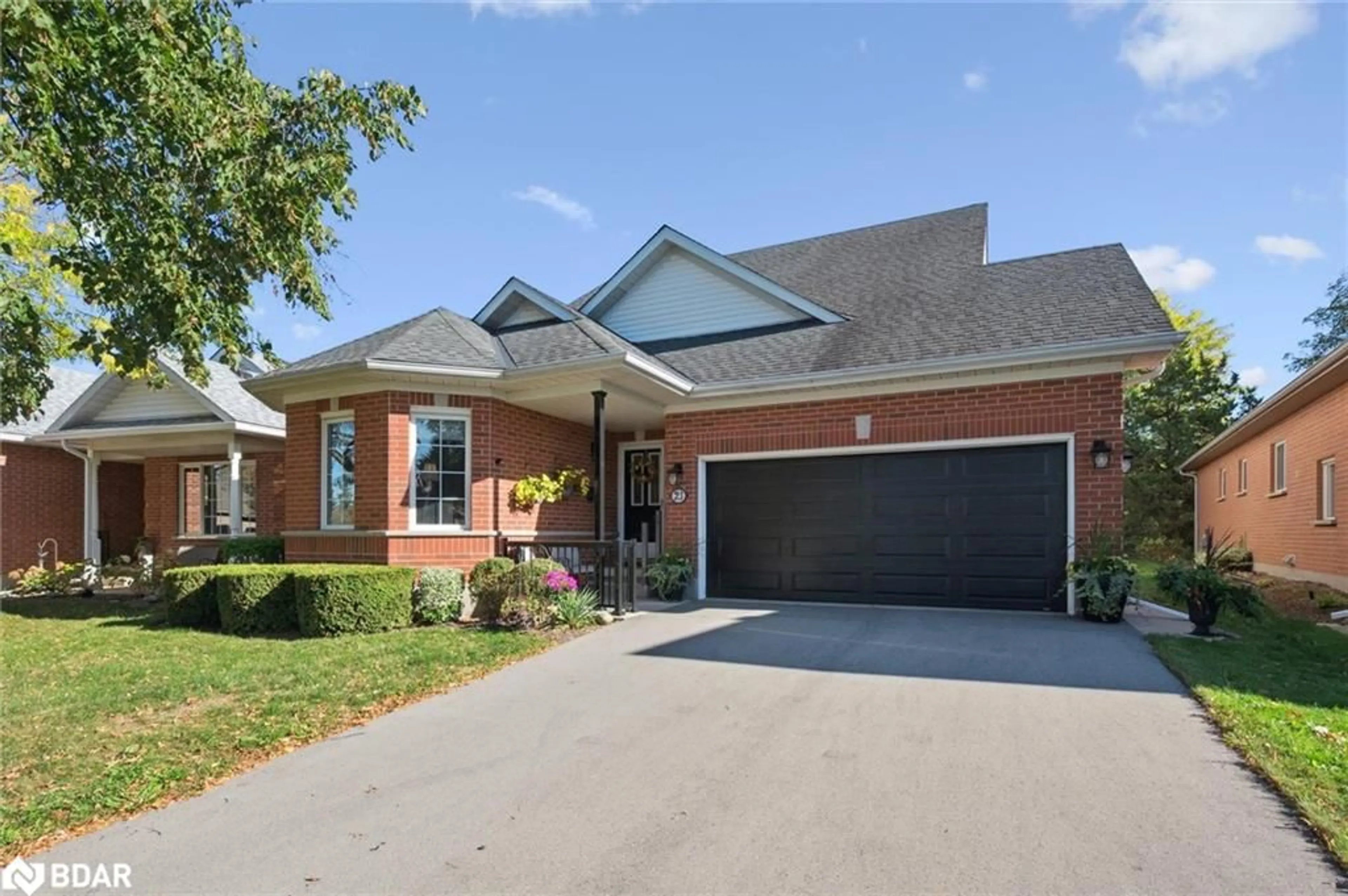 Home with brick exterior material, street for 21 Cherry Blossom Circle, Guelph Ontario N1G 4X7