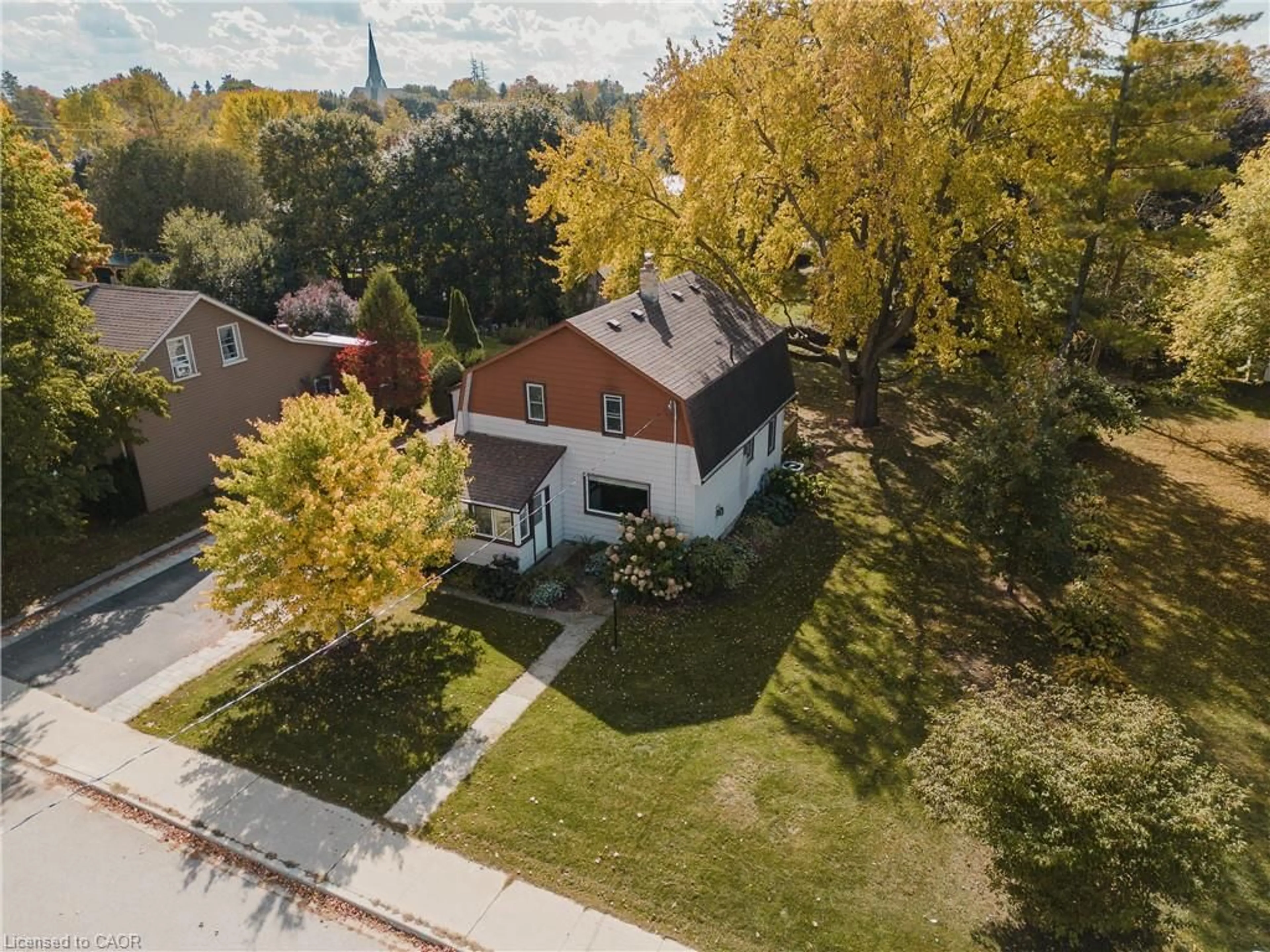 A pic from outside/outdoor area/front of a property/back of a property/a pic from drone, street for 78 George Street South, Harriston Ontario N0G 1Z0