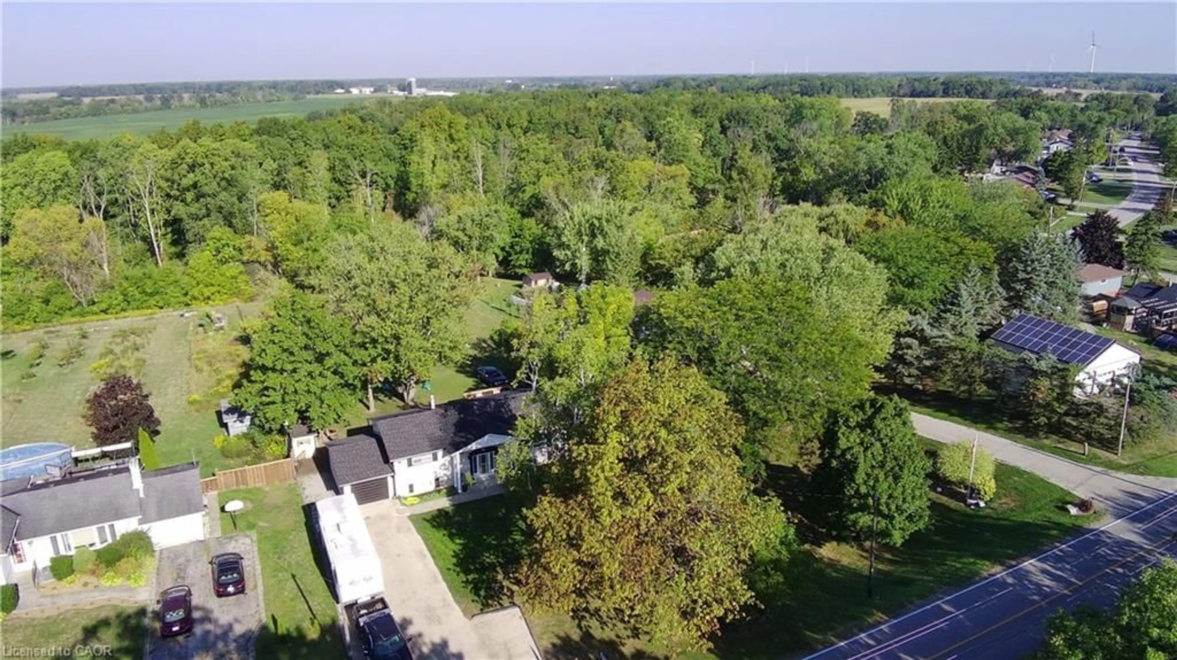 A pic from outside/outdoor area/front of a property/back of a property/a pic from drone, forest/trees view for 1118 Diltz Rd, Dunnville Ontario N1A 2W2
