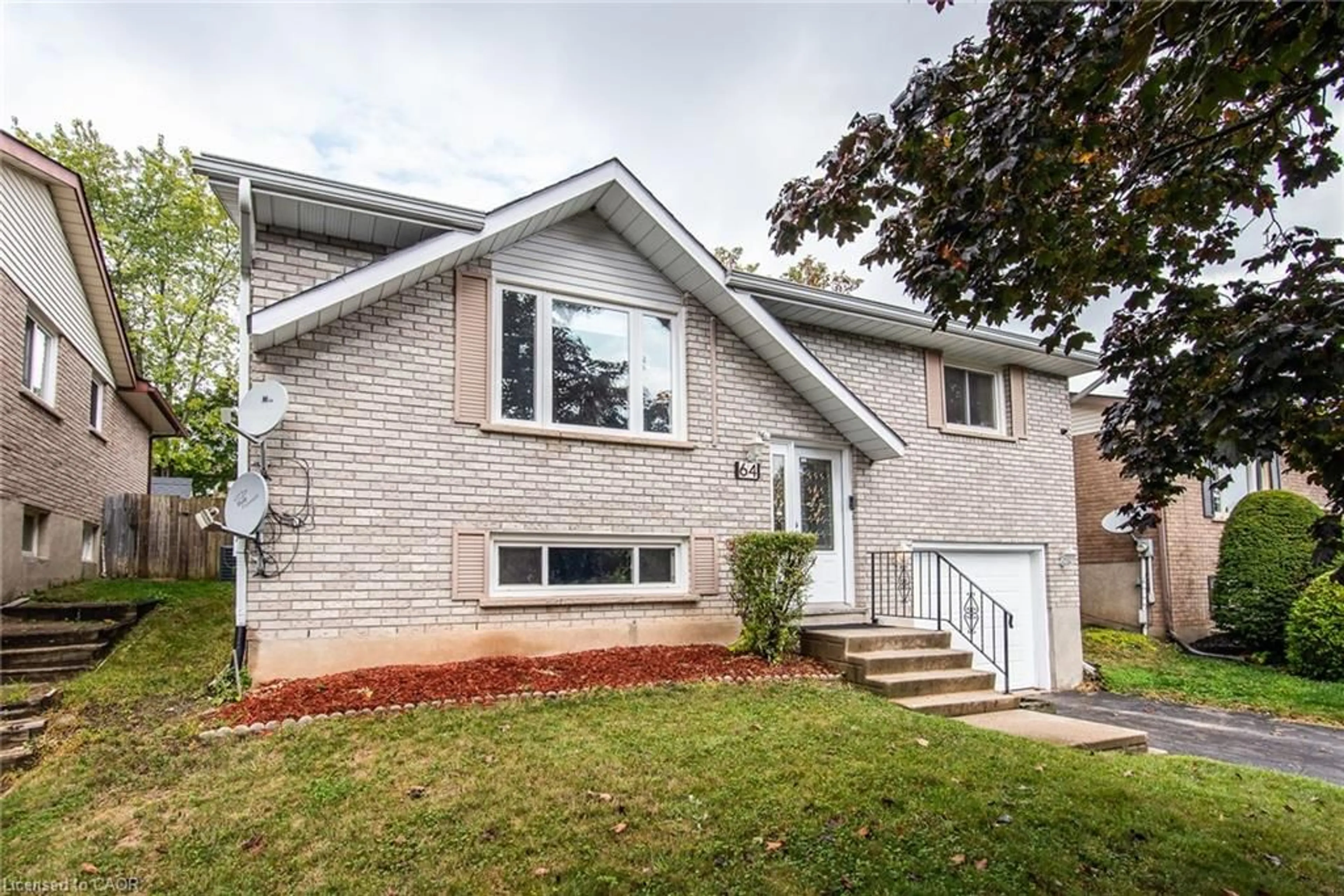 Home with vinyl exterior material, street for 64 Sabrina Cres, Kitchener Ontario N2P 1Y6