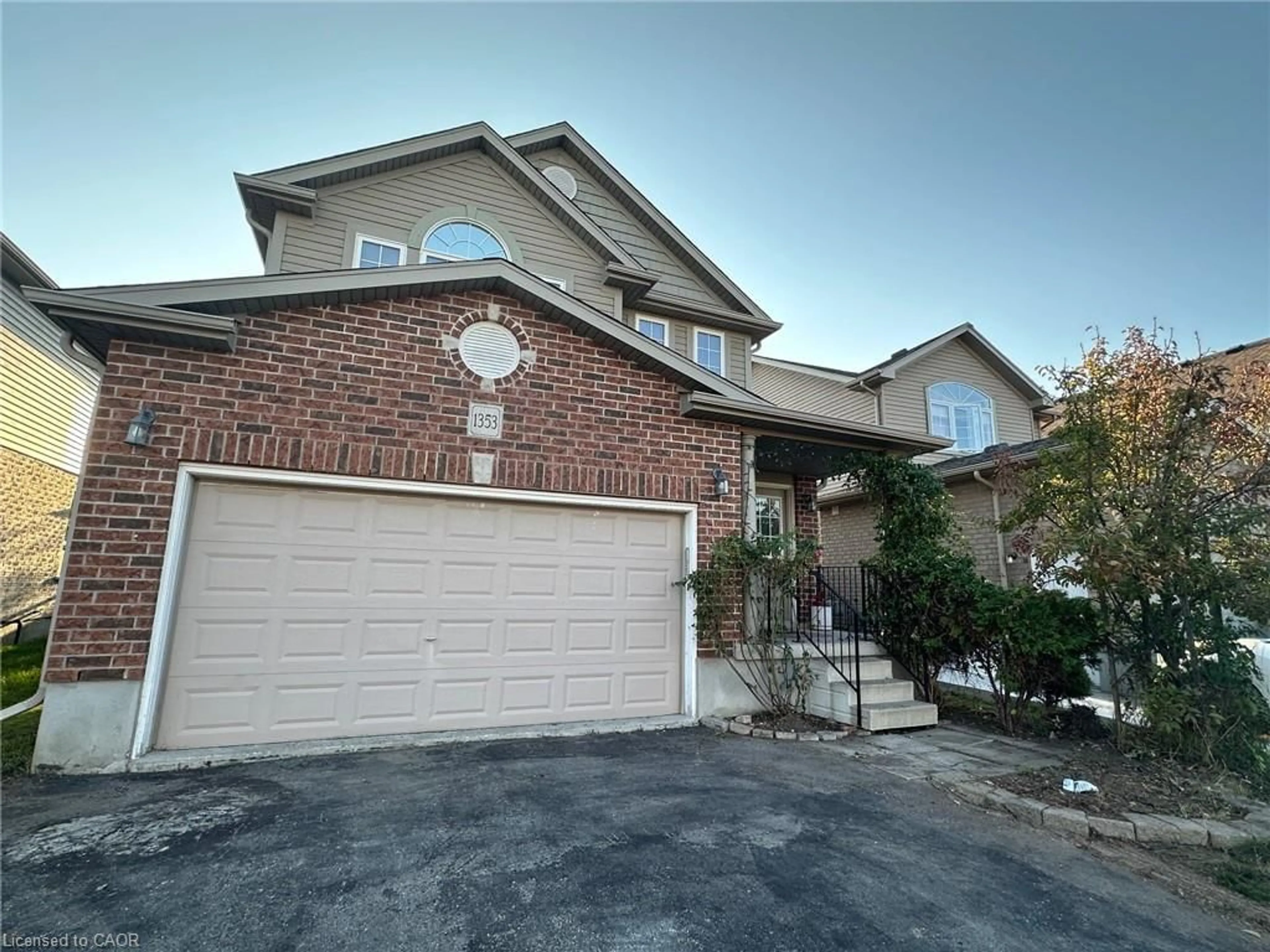 Home with brick exterior material, street for 1353 Old Zeller Dr, Kitchener Ontario N2A 0C6